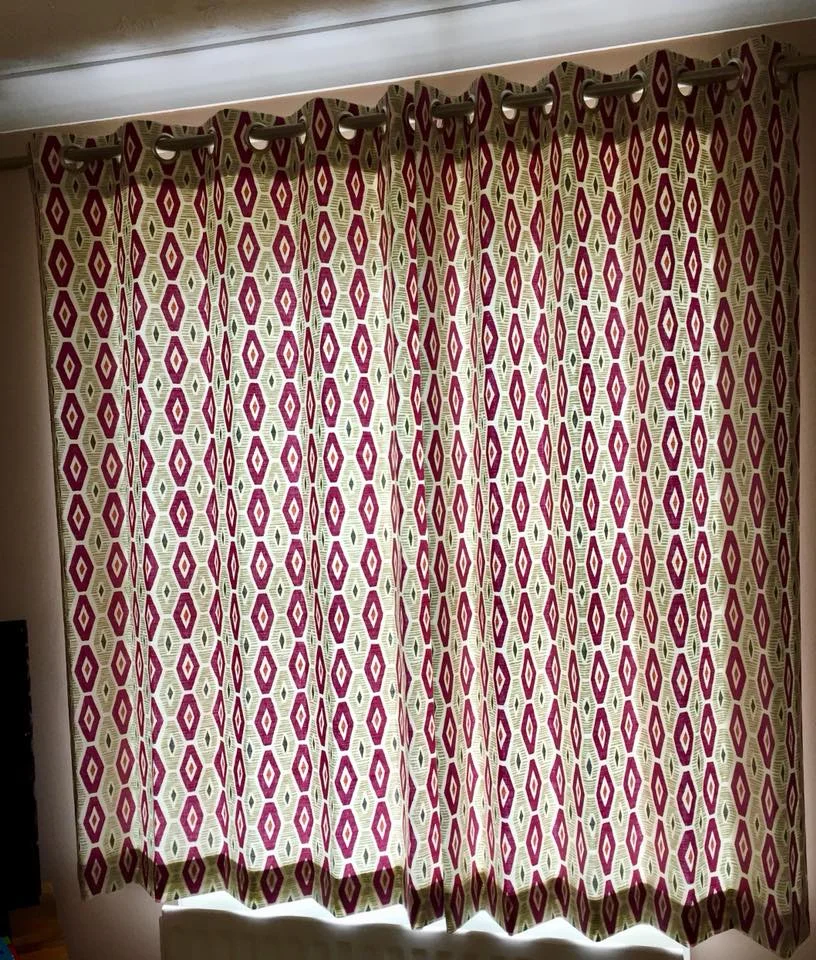 Curtains made with eyelets on existing poles