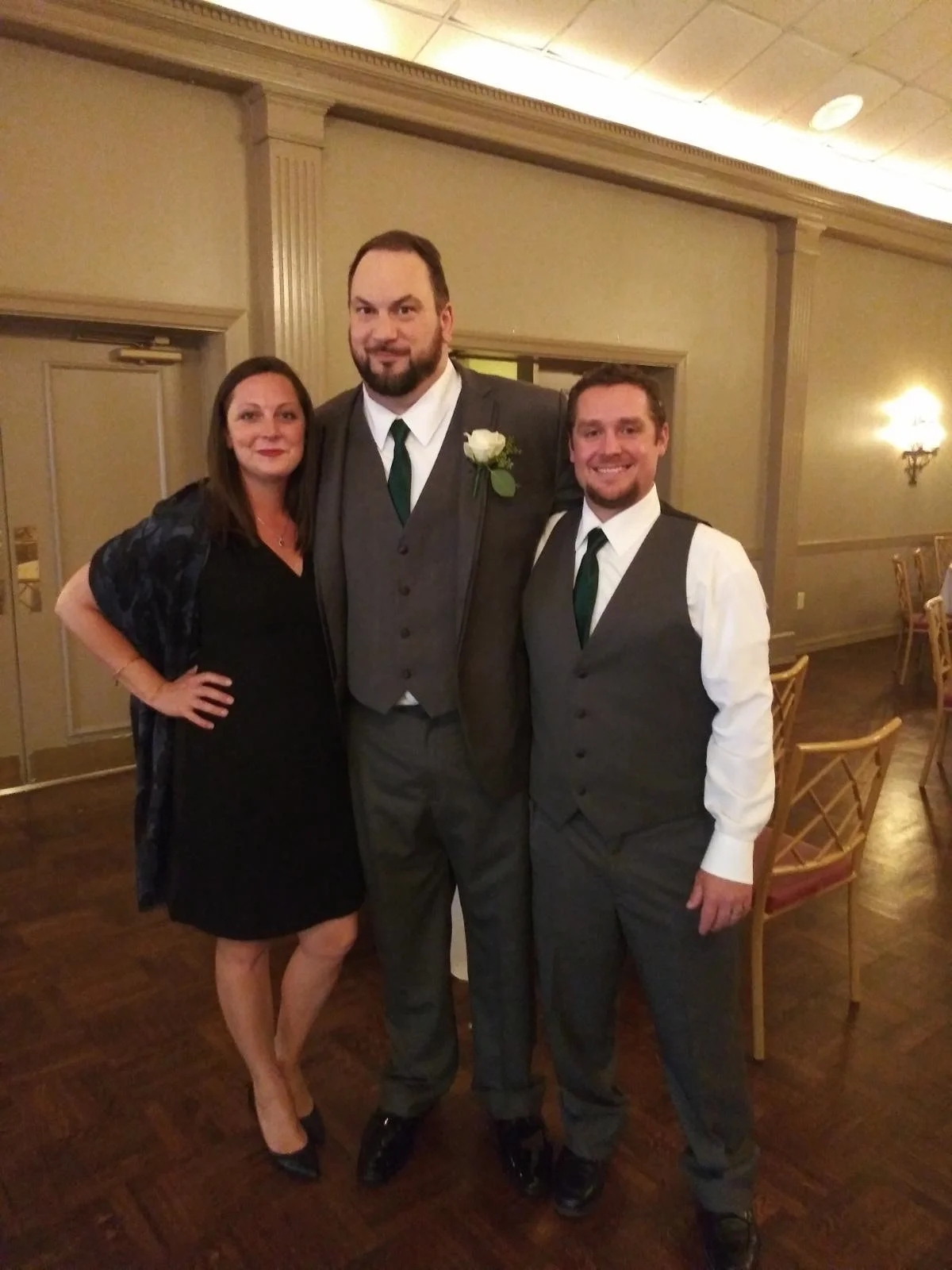 My sister and I with the groom at the reception!