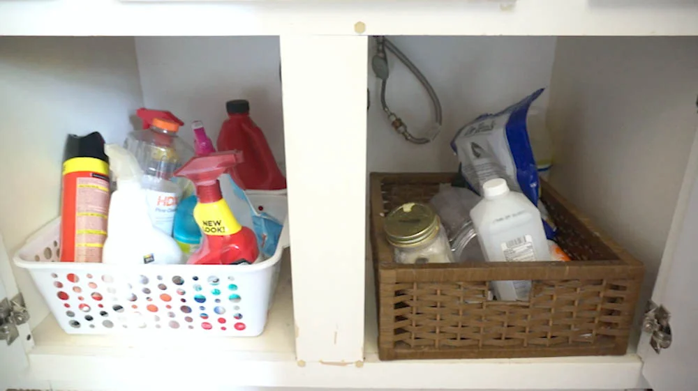 Unorganized Bathroom Cabinet Before Professional Organizer Session.jpg