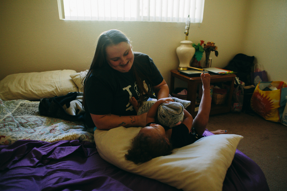 for the past couple days I’d been working on a film related to the sex trafficking problem in the fresno area. while the sights and sounds were largely grim, there were glimmers of hope. this is Arien, a survivor and now happy single mom playing with her 2 year old daughter in the bliss of an AC-filled room on a hot summer Sunday afternoon.