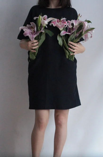 Flowers in pockets, why not? This is a self-portrait. 
