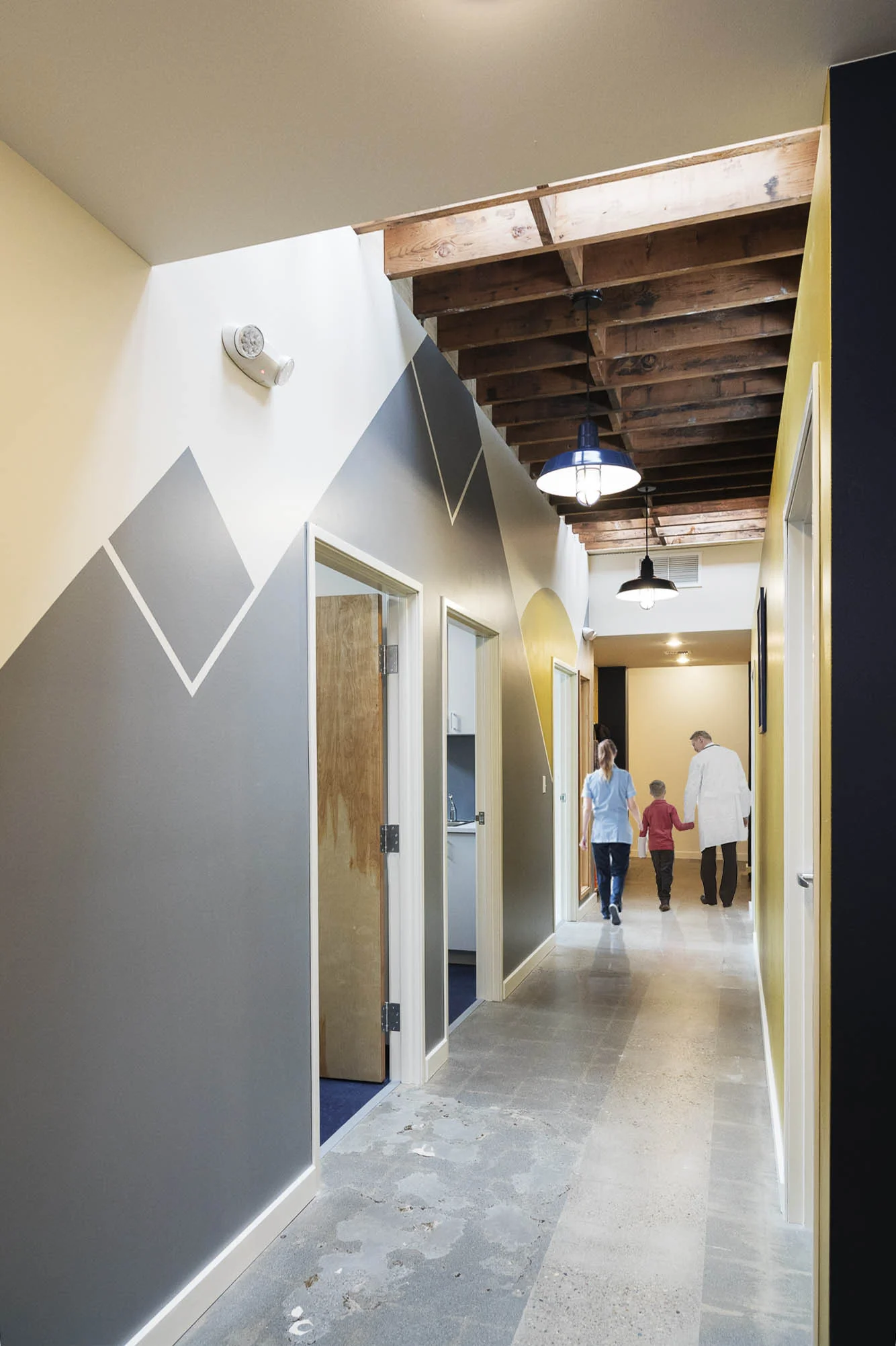 Mountain graphics, similar to the logo, are painted on many of the walls.