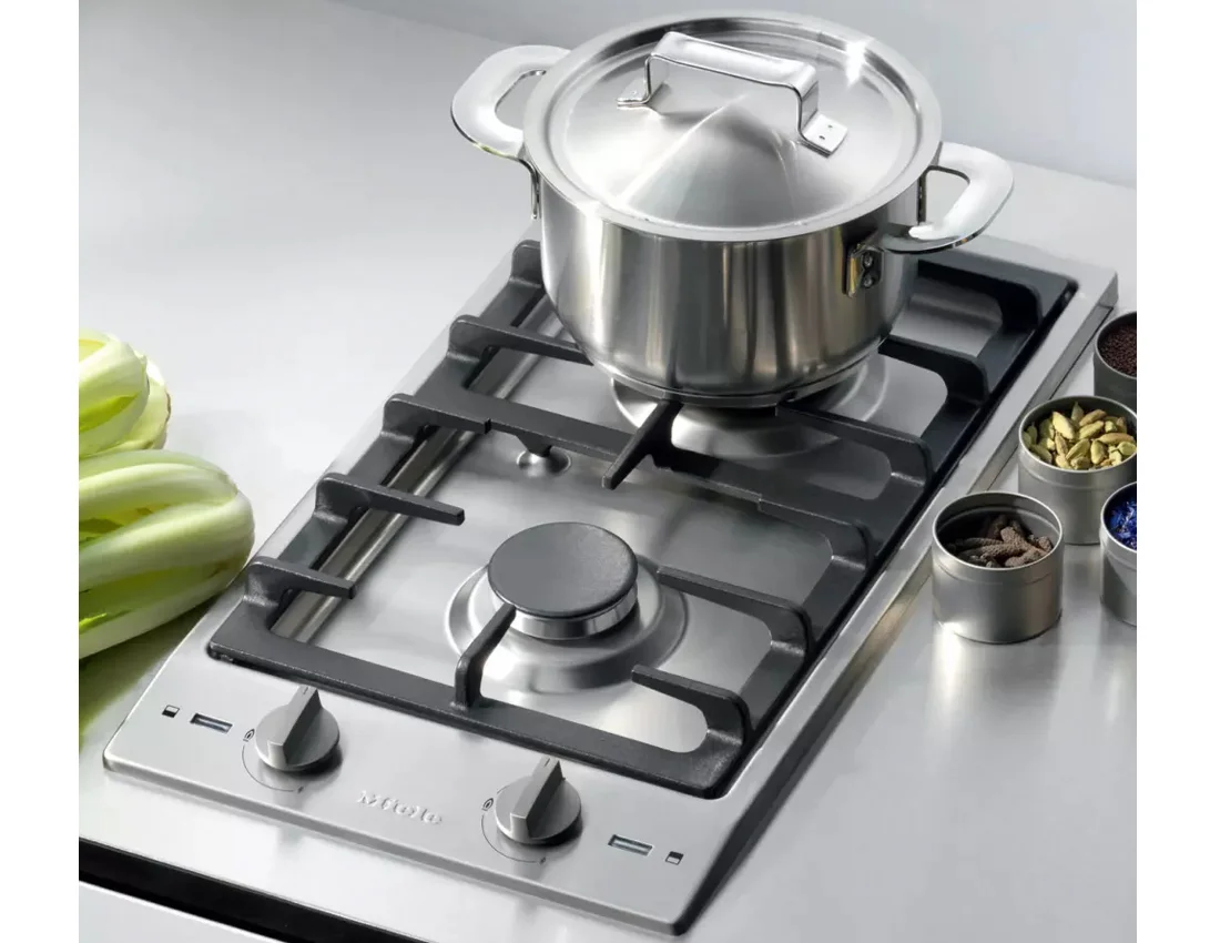 Miele's Where counter space saving is required and a wall oven is preferred, Miele's 12" cooktop is a great option. Two completely sealed gas burners offer a maximum output of 10,230 BTU's in a sleek and compact package. This is great for a backyard cottage that might not need a full 4-burner option.