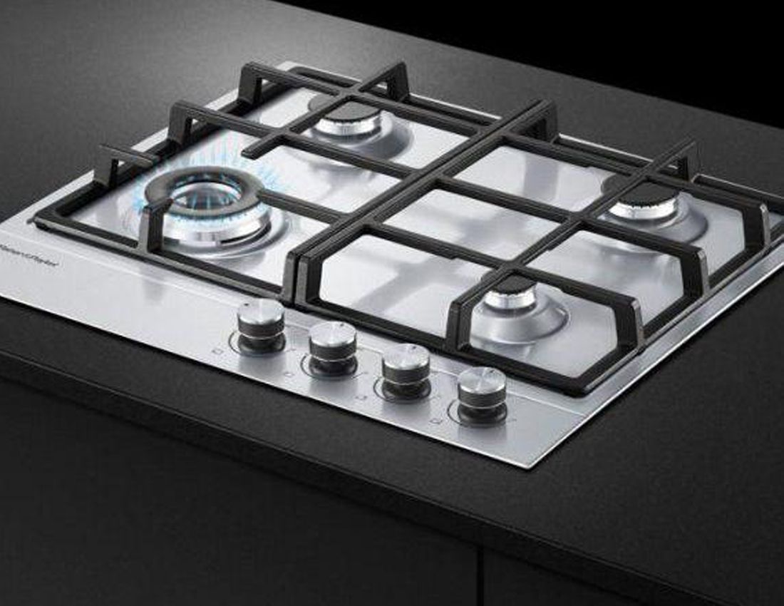 Fisher + Paykel's Fisher + Paykel's gas cooktop comes in three different sizes to suit your needs and space constraints. The max heat output is 11,000 BTU on the 24" unit and the design and knobs feature a sleek two-tone stainless steel finish. 