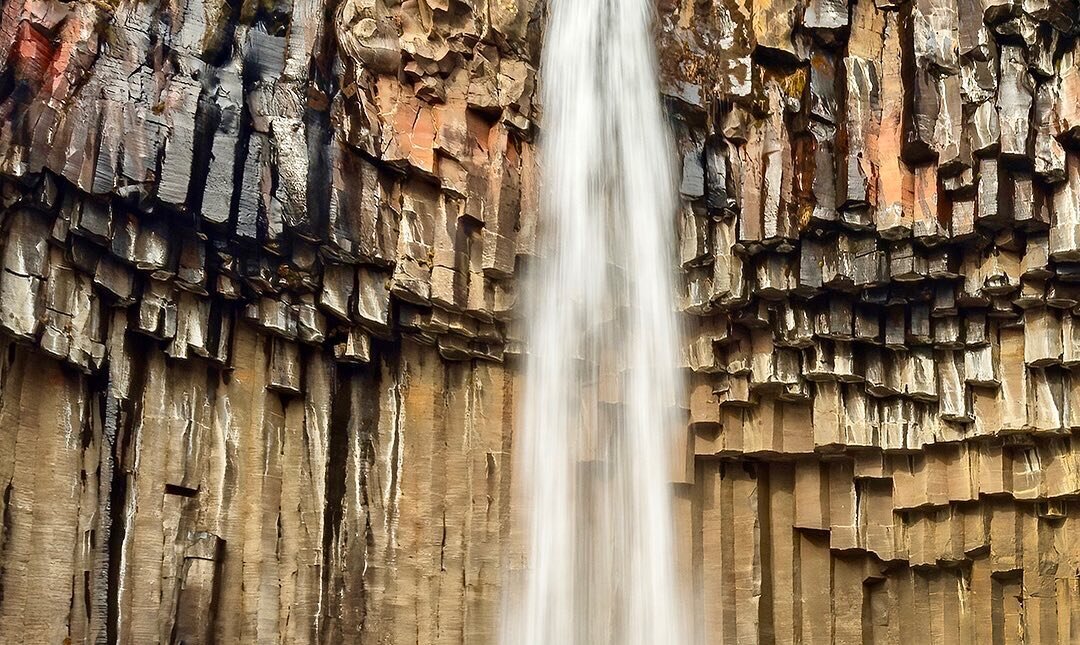 Svartifoss. My favorite waterfall, flanked by the beautiful warm tones of giant basalt columns and fed by glacial meltwater. 
#visiticeland #svartifoss #stunningiceland#icelandicwaterfalls #icelandair #icelandimages #icelandphotography