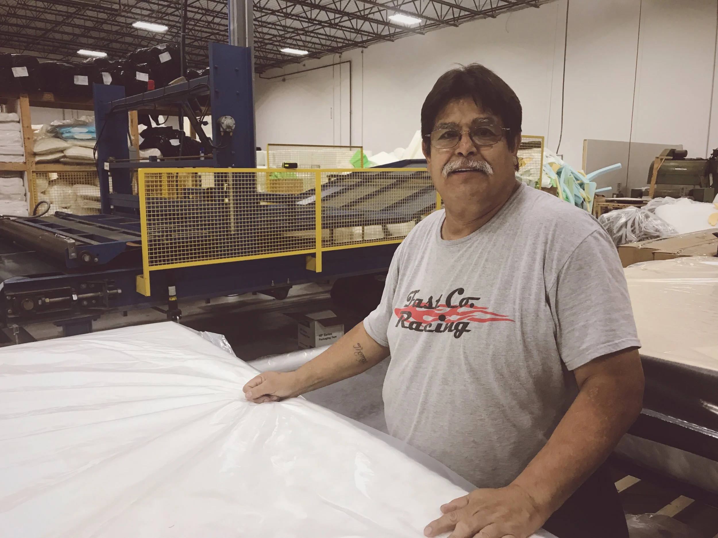 Tom Rodriguez, building mattresses at the Comfort Option headquarters in Indianapolis / Greenfield, Indiana.