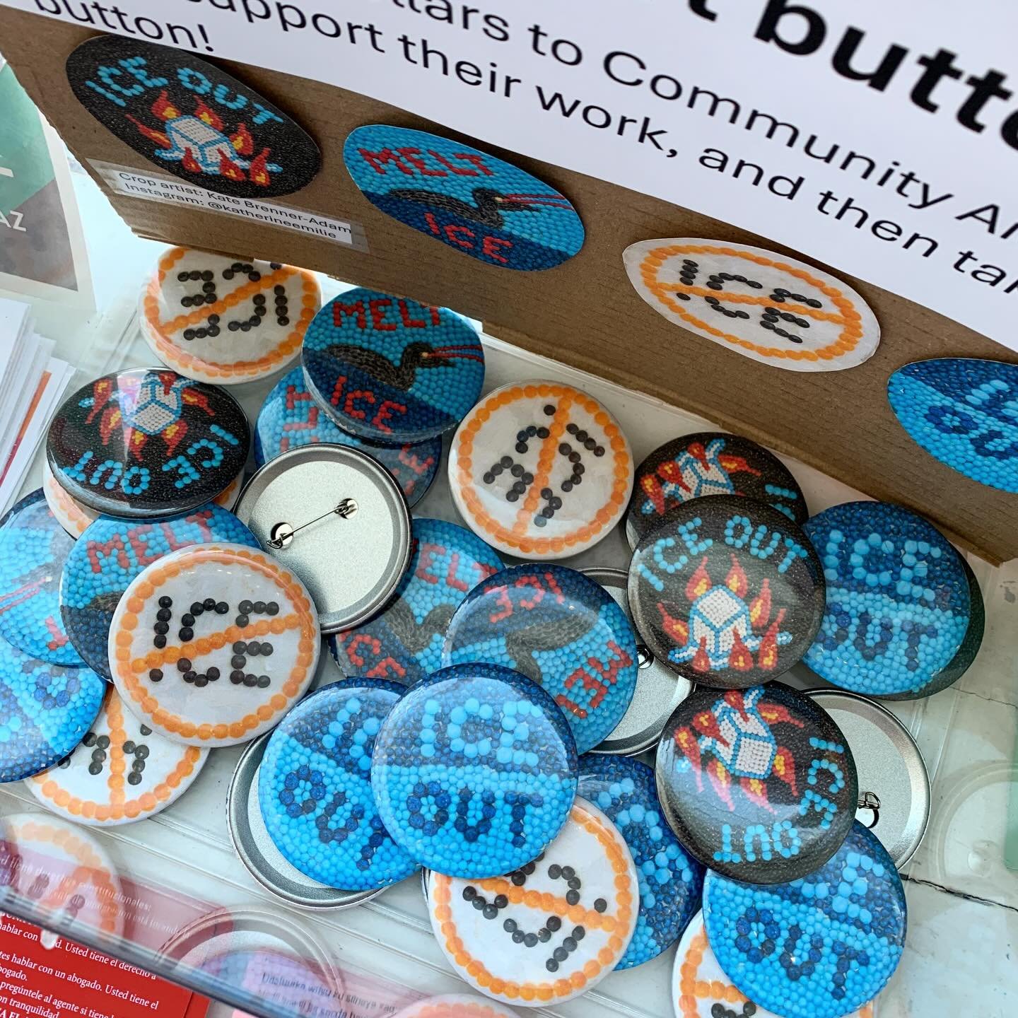 we have 🚫🧊crop art buttons, designed by @katherineemilie ! scan the QR code attached to the box to made a donation to @communityaidnetworkmn and grab a button.