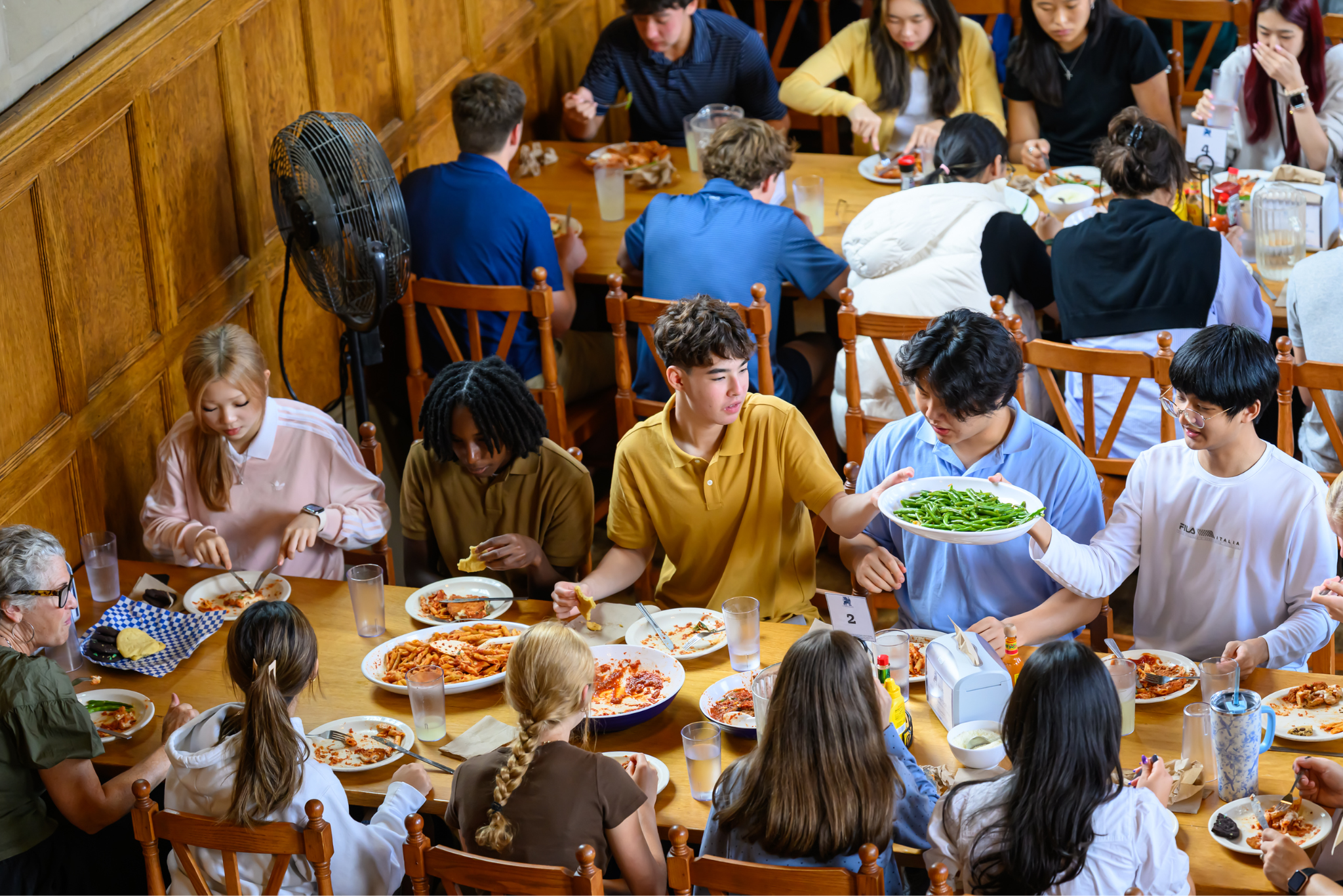 A meal service scene in the St. Mark’s dining hall