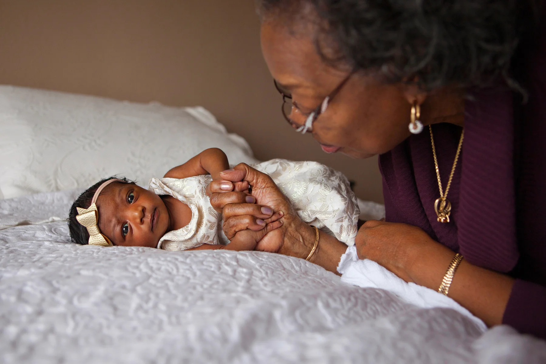 Look how much she changed in just a few days! Great Grandma came to town and I just had to grab a photo of these two holding hands.