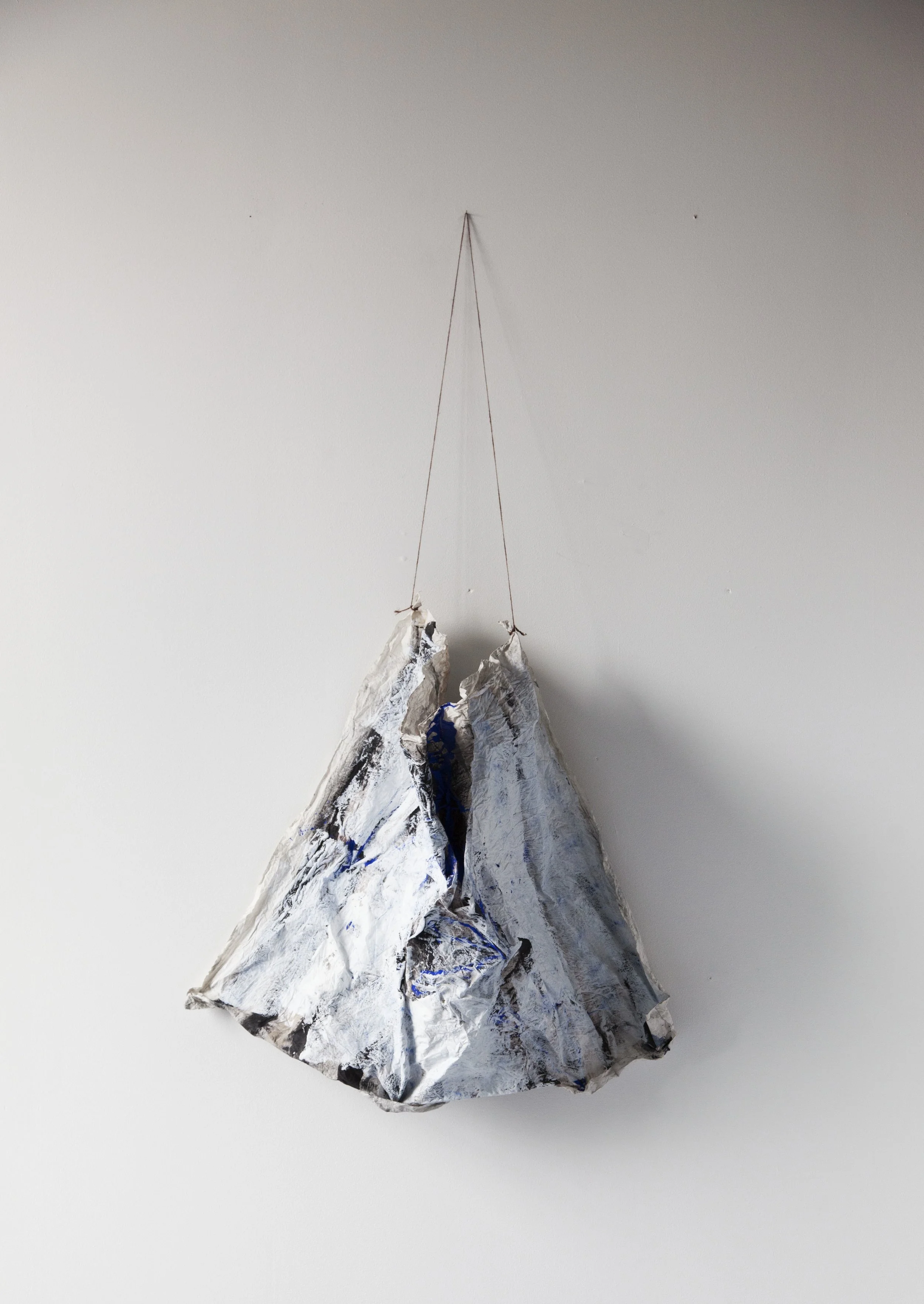 Painting hanging in a string.jpg