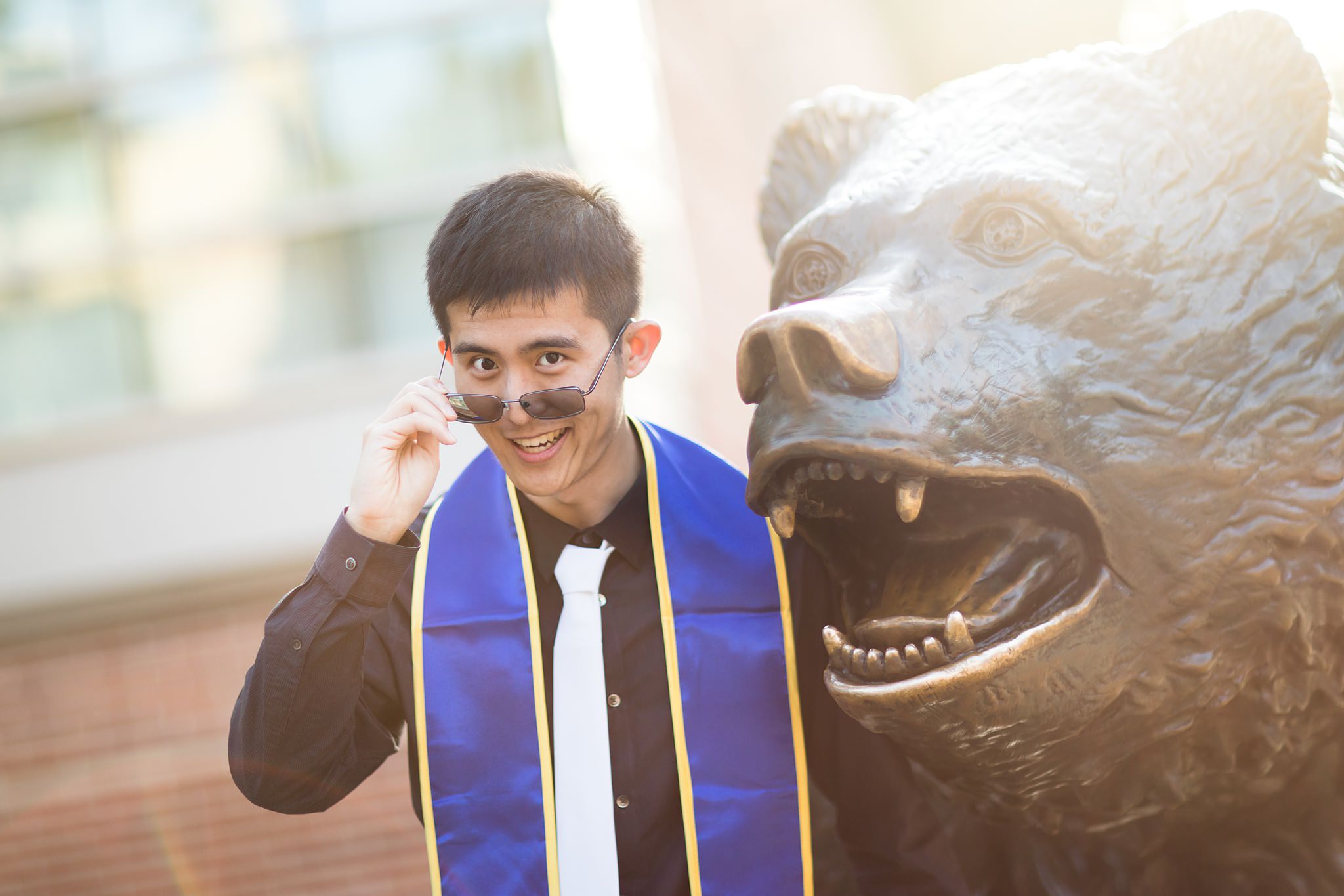 los-angeles-ucla-senior-graduation-portraits-at-bruin-bear-looking-over-glasses