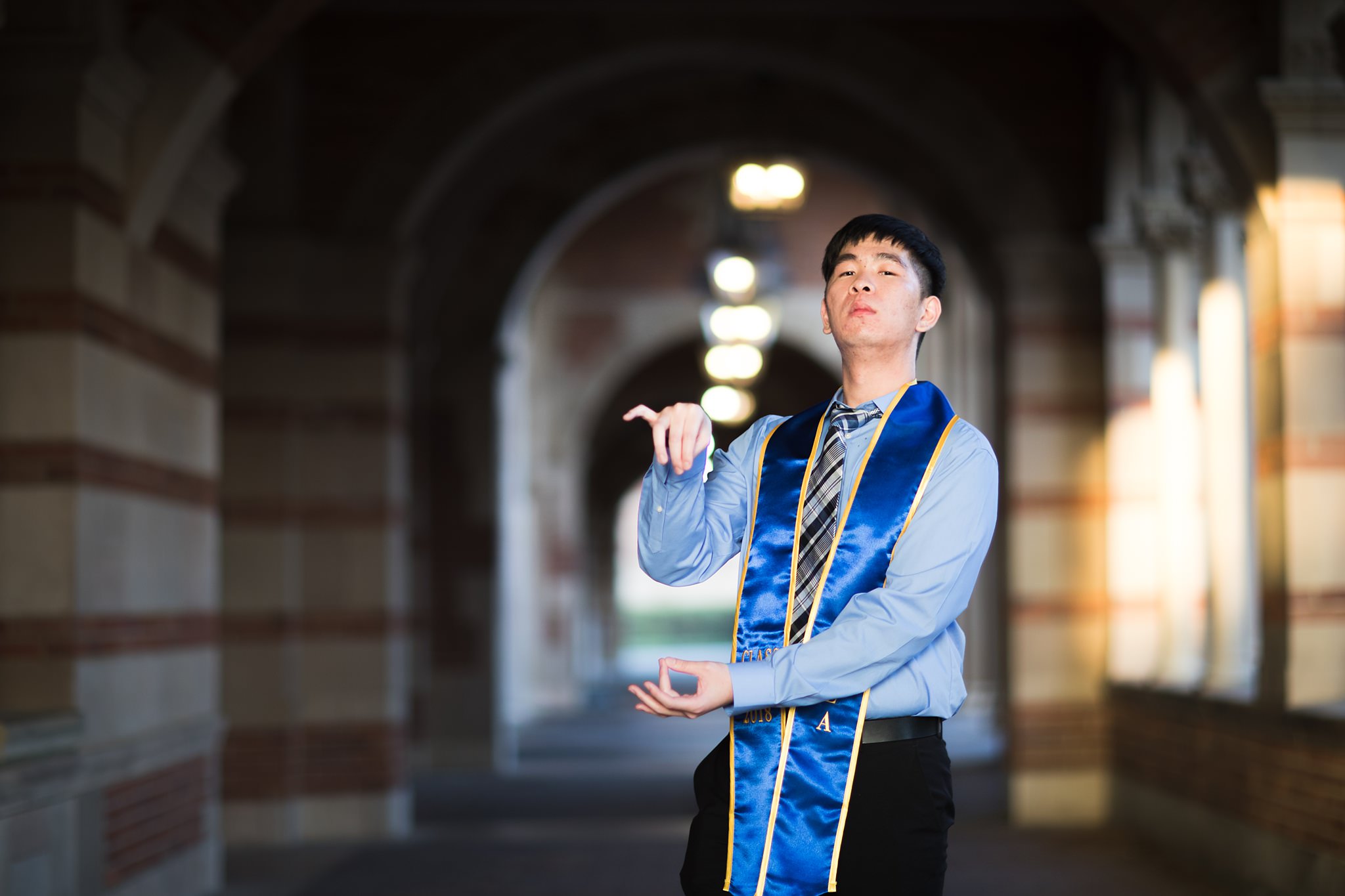 los-angeles-ucla-senior-graduation-portraits-royce-hall-arches-symmetra-pose