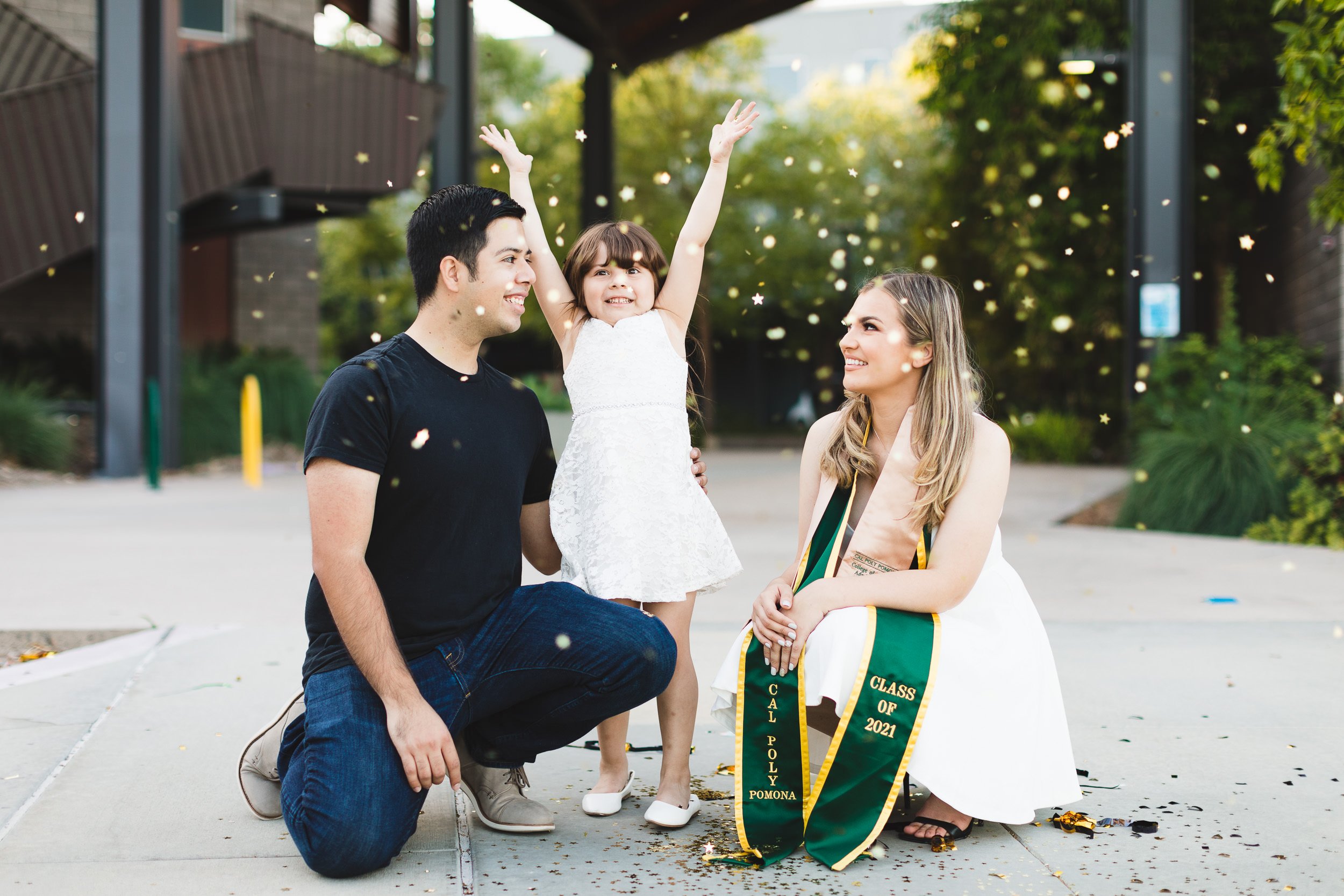 Graduation portraits for moms, kids, and whole family, confetti throwing in the air. Pasadena, CA.