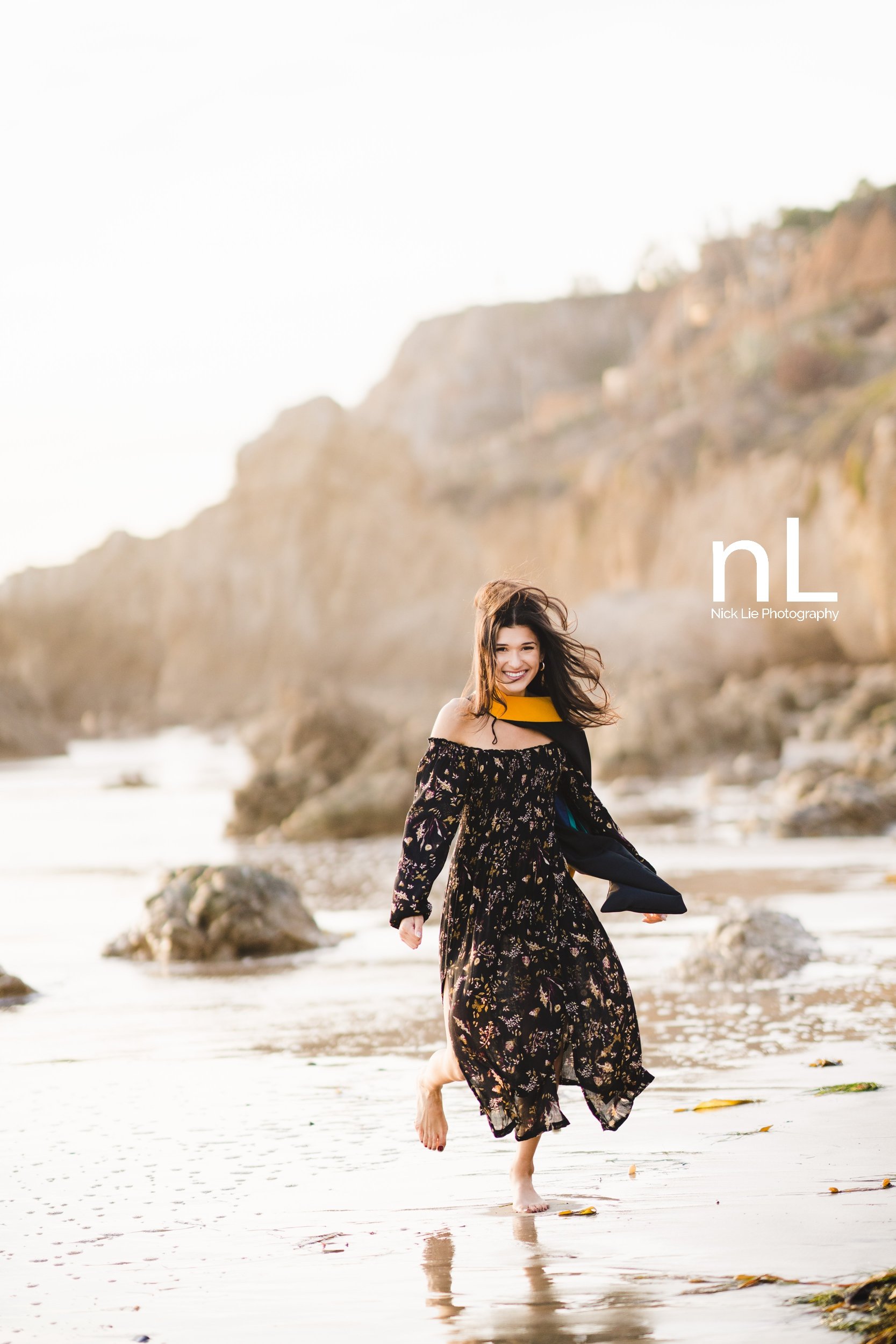 Beach graduation portraits at sunset