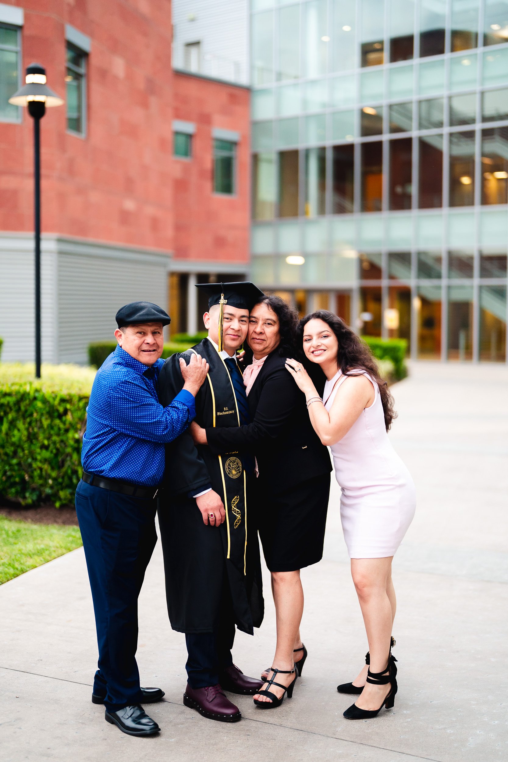 Formal graduation portrait of CSULA Family
