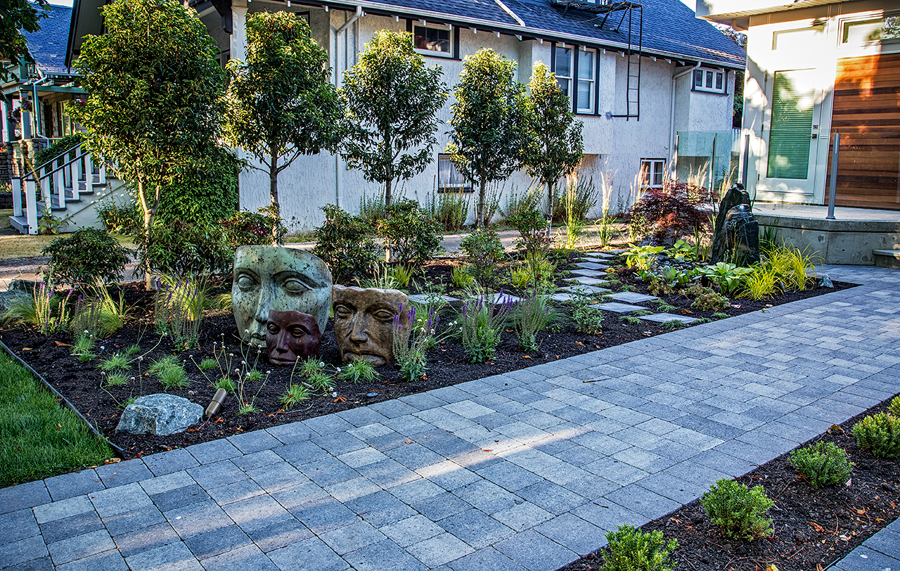 Faces of Mother Nature-statues-water garden-MustangLandscape-Victoria-BC-garden-shrubs-trees.jpg