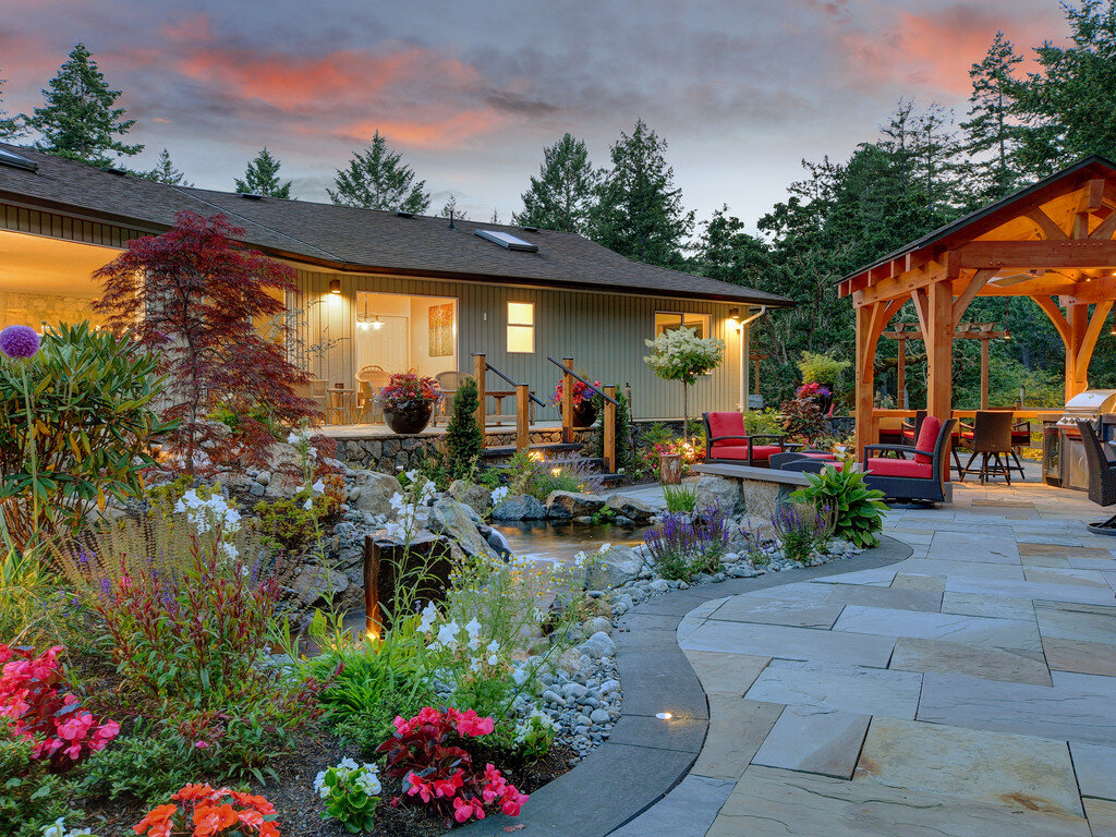 2-landscape-lighting-japanese-maple-outdoor-pond-granite-blue-stone-interlocking-bricks-pavers-daisies.jpg