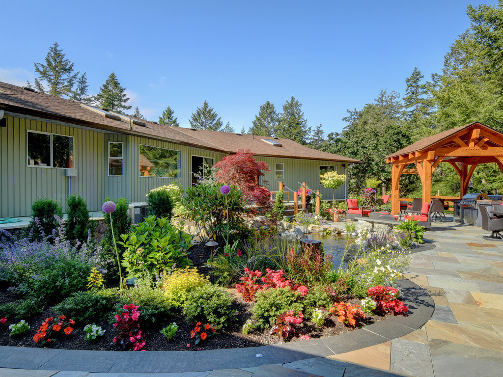 japanese-maple-begonia-salvia-interlocking-pavers-blue-stone-pergola-island-timber-frame-outdoor-living-kitchen-pond.jpg