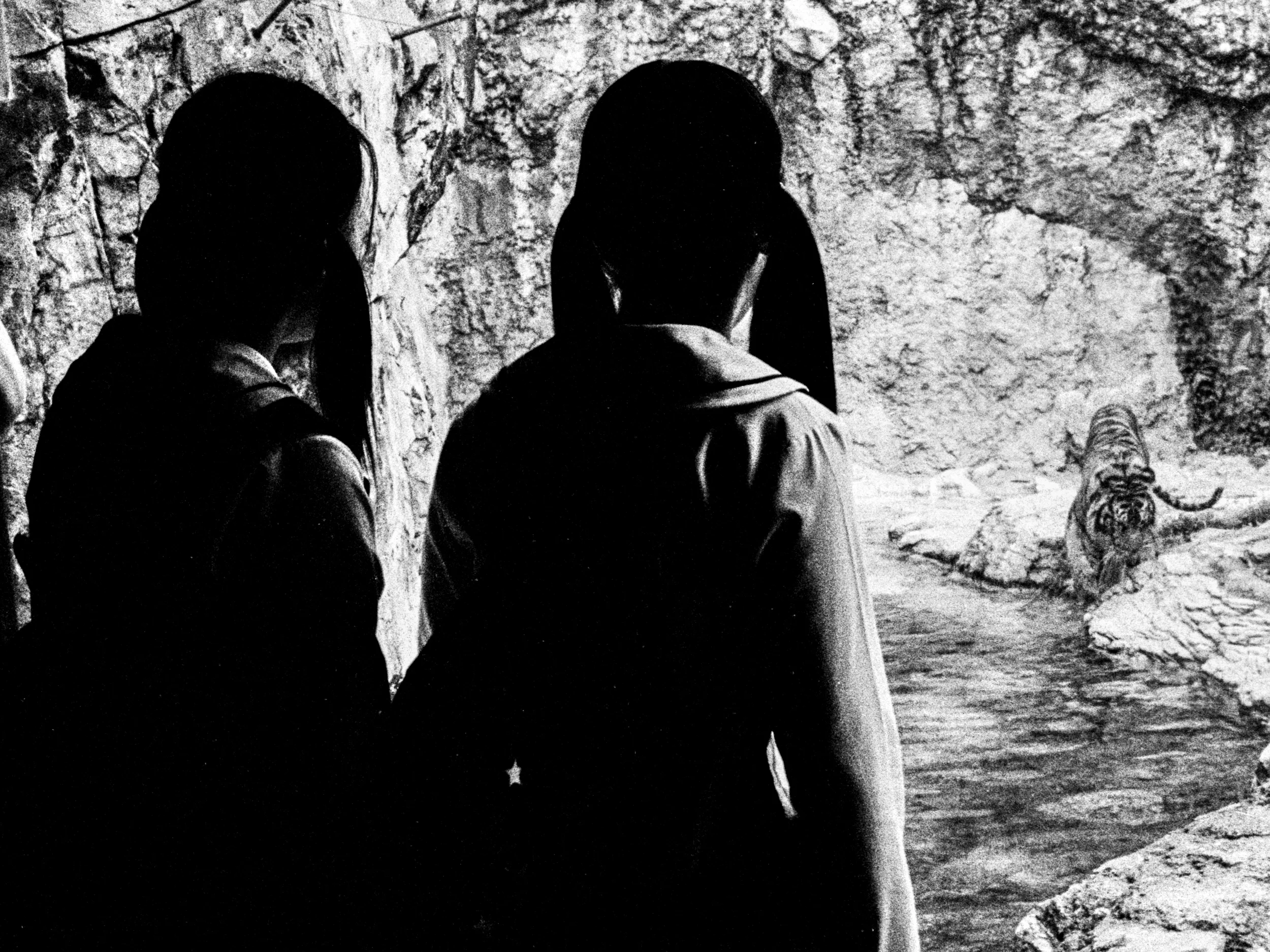 Two Schoolgirls with a Tiger from the series Tokyo is Yours ©Meg Hewitt