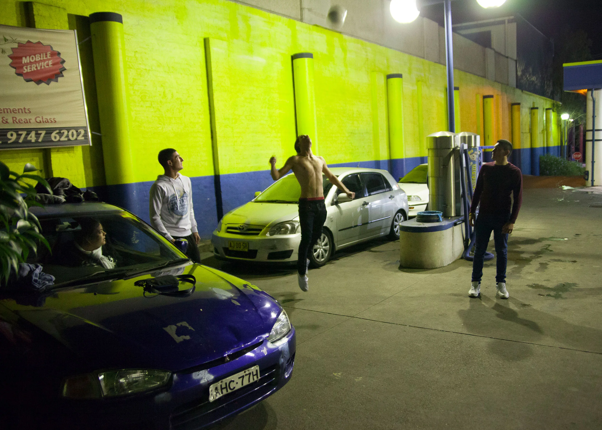 Late night football at Wash n' Wax, Concord. ©Lyndal Irons