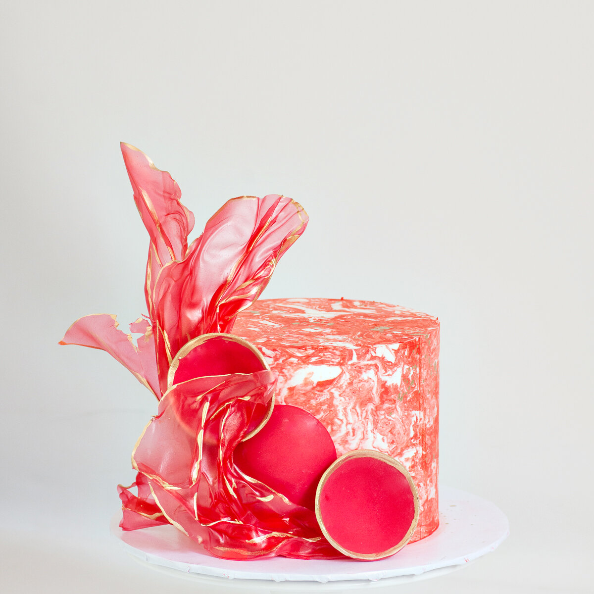 Red marbled buttercream cake