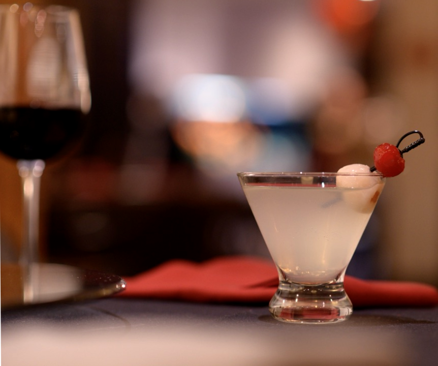 The Lychee Martini, Lychee liquor with a sweet and sour mix garnished with a cherry and lychee fruit, served at Royal China