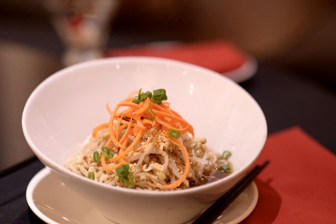 The Thin Dan Dan, hand-made thin noodles served cold in a tangy Sichuan peppercorn sauce and topped with crushed peanuts, served at Royal China