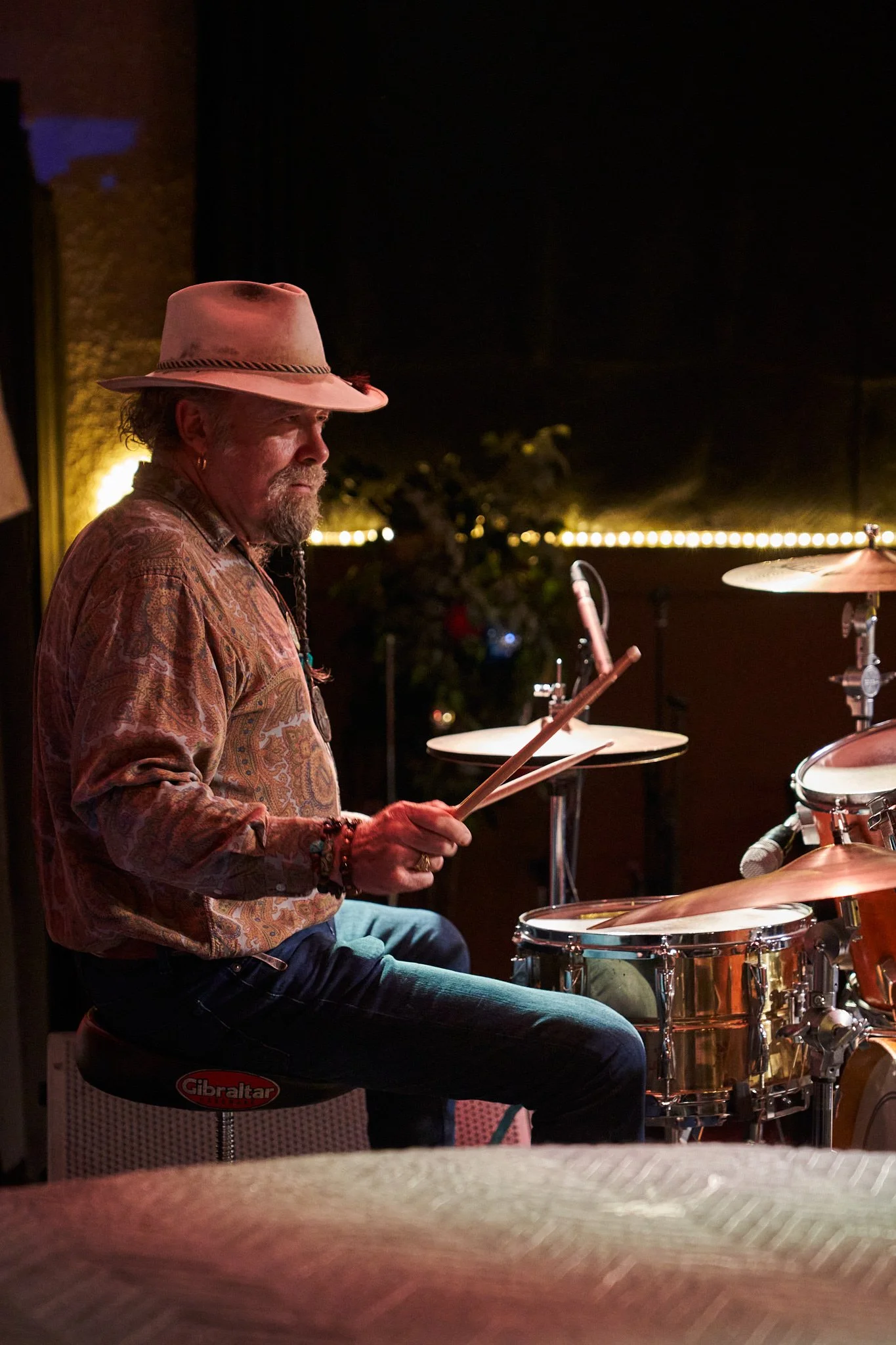 Alberta roots Drummer Thom Moon playing with Tim Hus at Calgary's iconic Ironwood Stage and Grill. Captured by Stance Creative event photography.