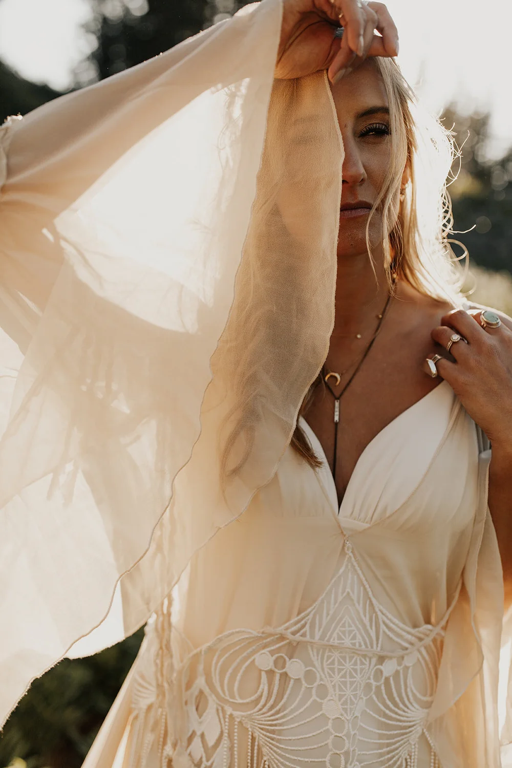 Luna wedding dress for the hippie bride. Bell sleeves and flowy silk  chiffon.  Daci Gowns