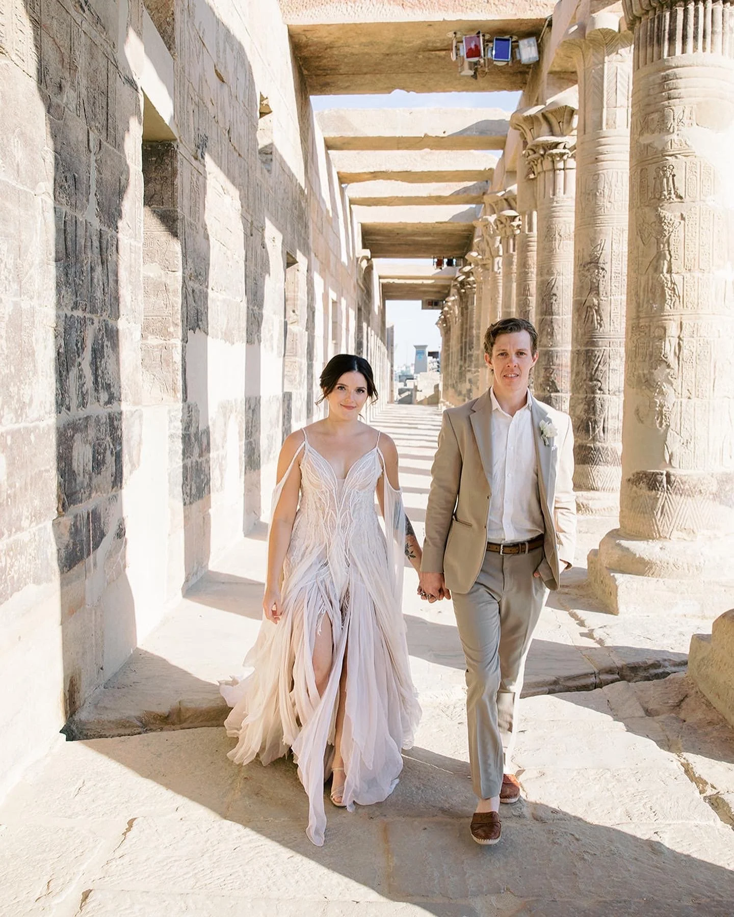 Sexy and flowy, open back, spaghetti strap and plunge neckline. FInding The perfect dress for A November Elopement in egypt