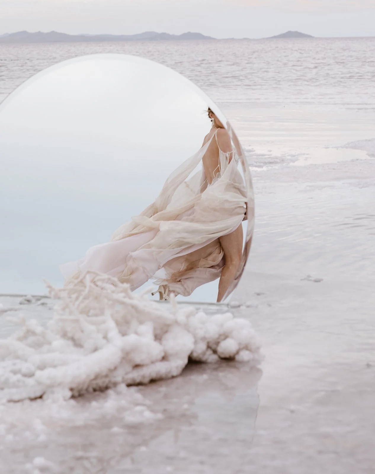 Romantic custom wedding dress with open back and bell sleeves