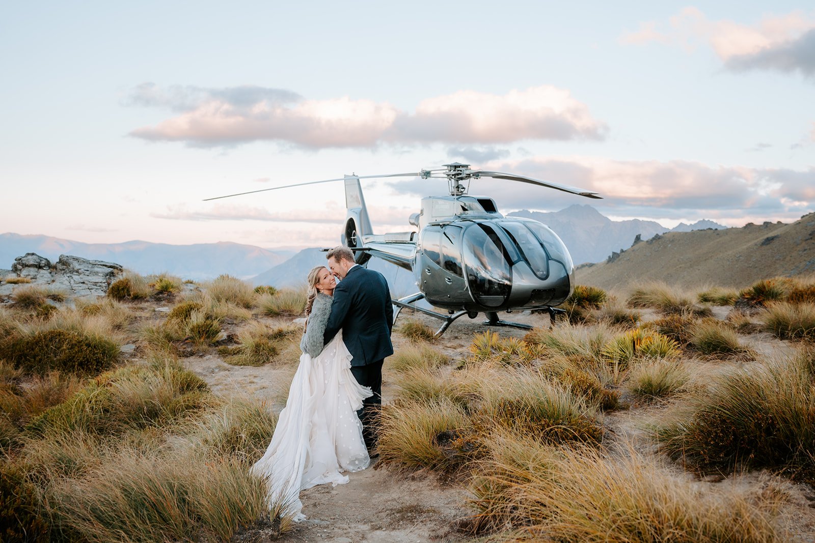 Esther flowy wedding dress on Queenstown mountaintop overlooking Lake Wakatipu