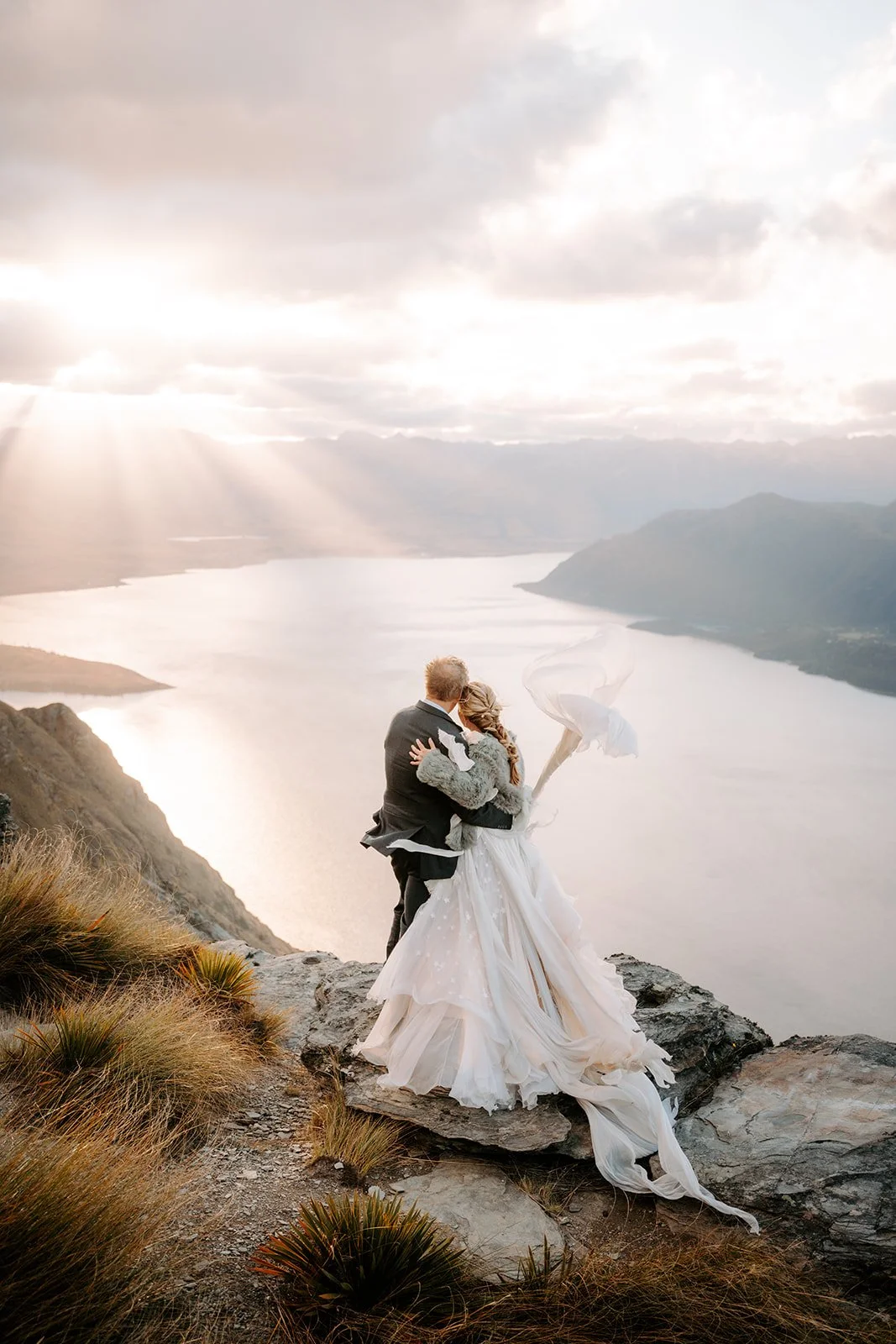 Flowy silk chiffon elopement dress overlooking Lake Wakatipu in New Zealand