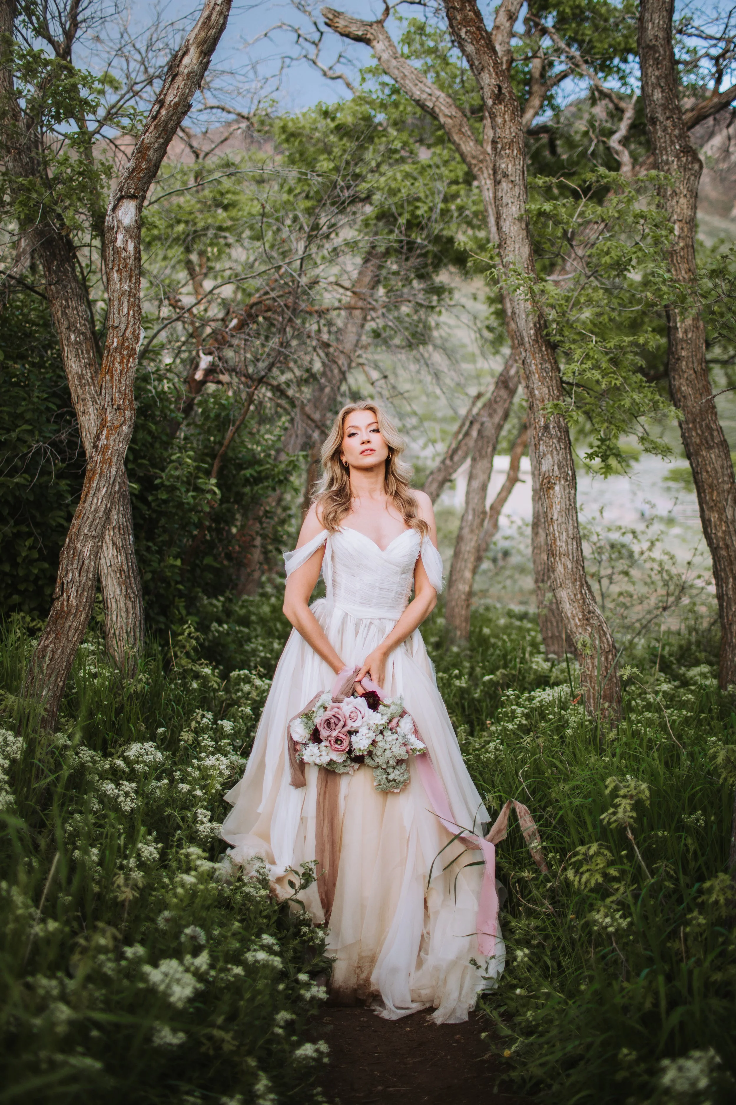 Romantic bridal portraits among wildflowers