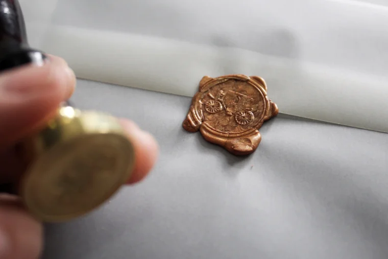 Get Marked offers a wide variety of wedding themed wax seals (their “carriage stamp” shown above.) They also offer the opportunity to submit your own design for a custom wax seal. 
