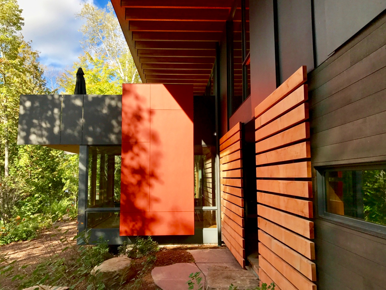 A Vibrant Autumn Sun Illuminates This Modernist Facade