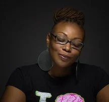 Kinitra D. Brook, author of Searching for Sycorax: Black Women's Haunting of Contemporary Horror.