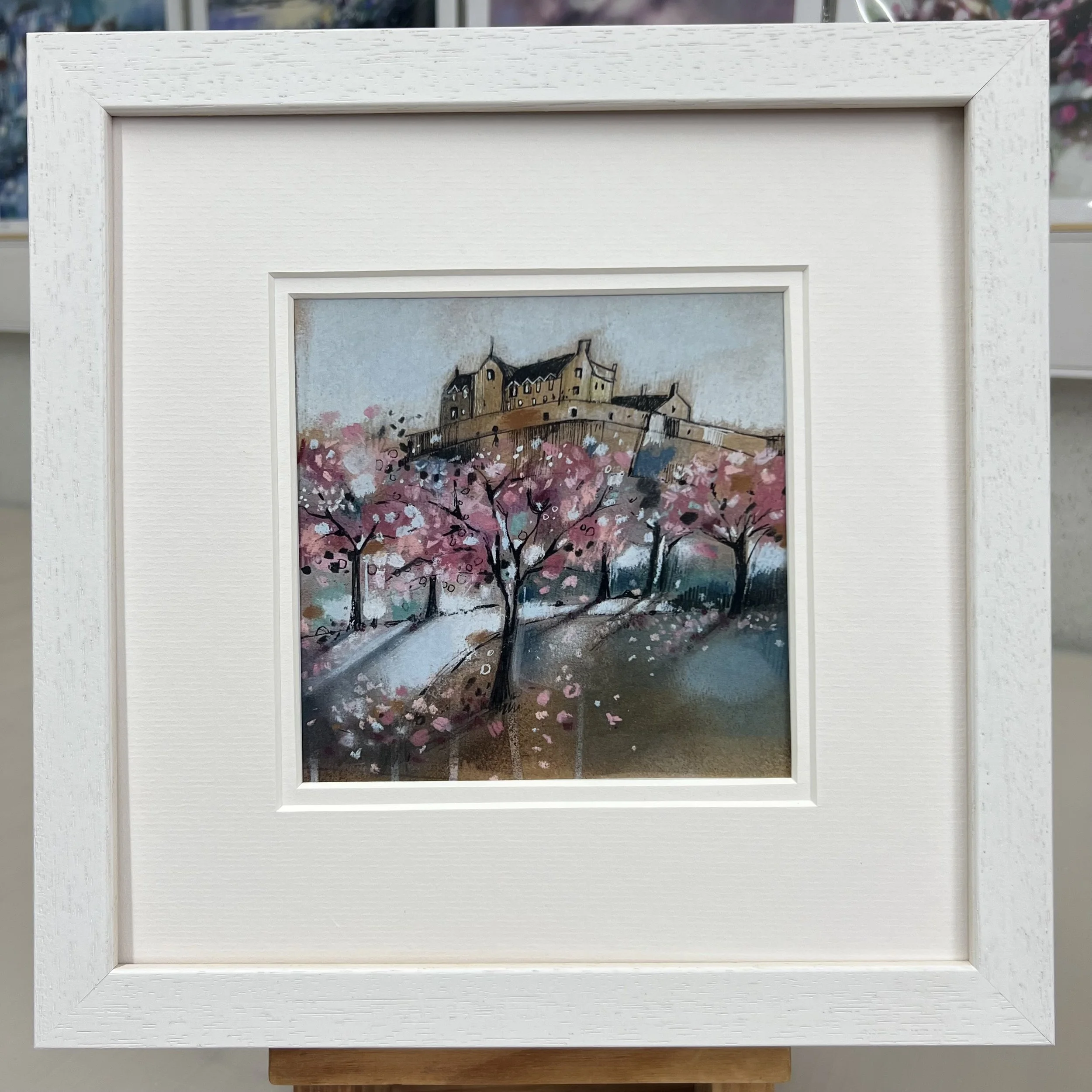 Framed Art Card Edinburgh Castle & Princes Street Gardens by Scottish Landscape Artist Emma S Davis. White Frame Double Mount