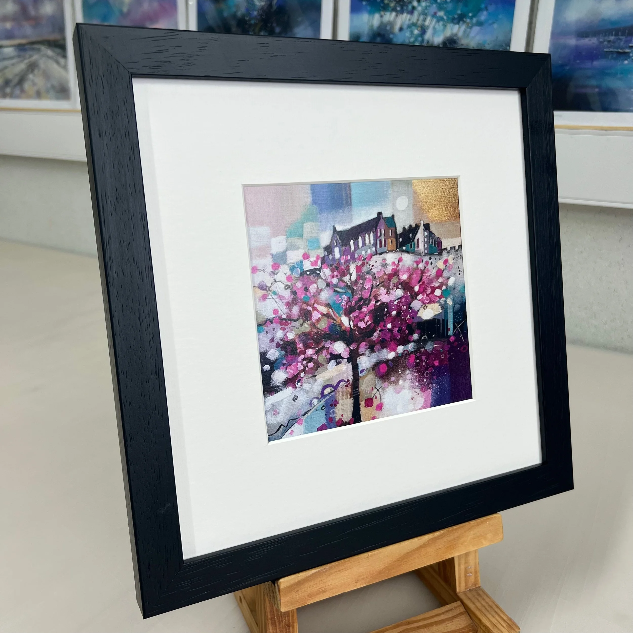 Blossoms on Princes Street, Edinburgh - Framed Greetings Card by Emma S Davis Artist - black frame side view