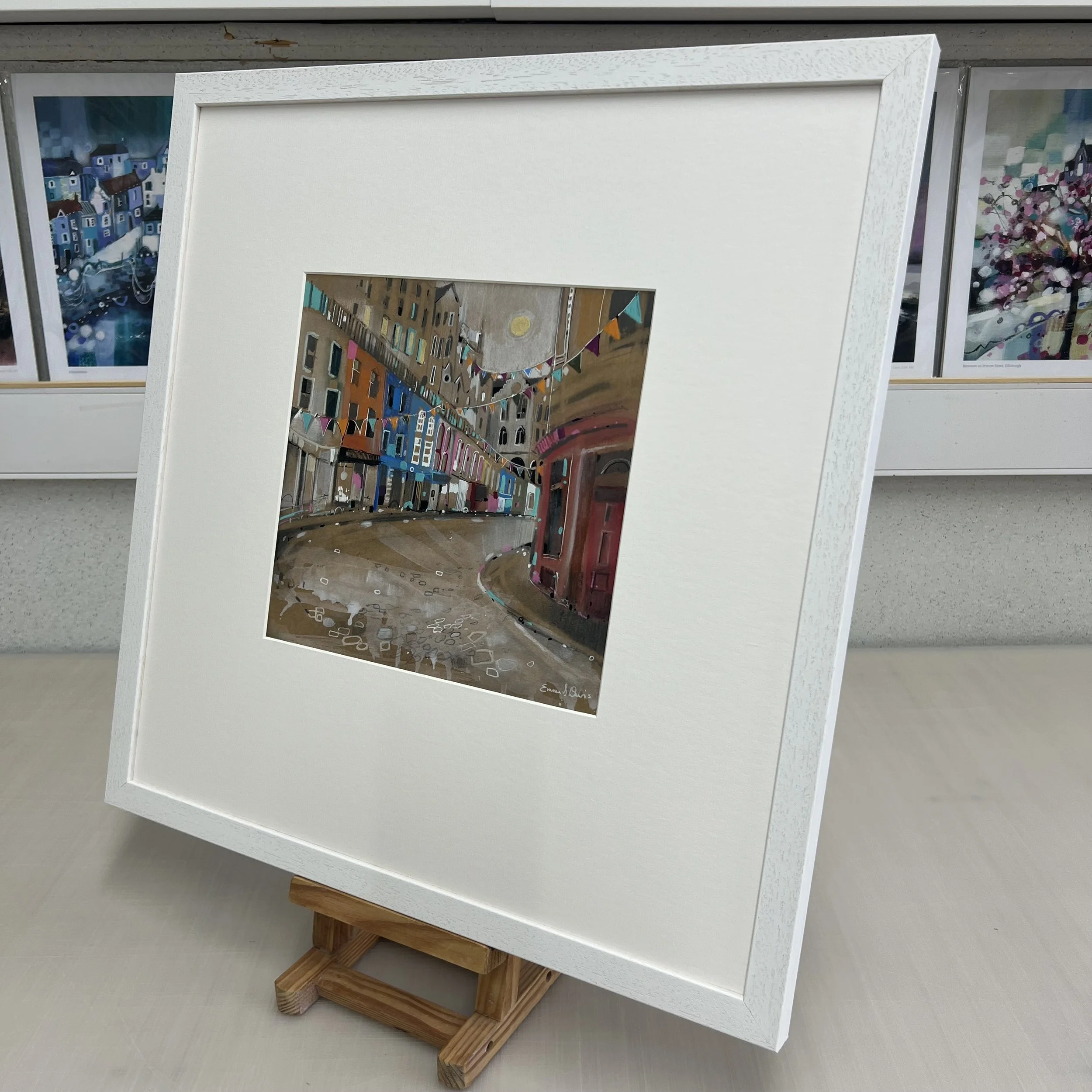 Bunting, Victoria Street, Edinburgh by Emma S Davis – original mixed media artwork featuring colourful bunting and the famous curved street in Edinburgh’s Old Town. Alternate view.