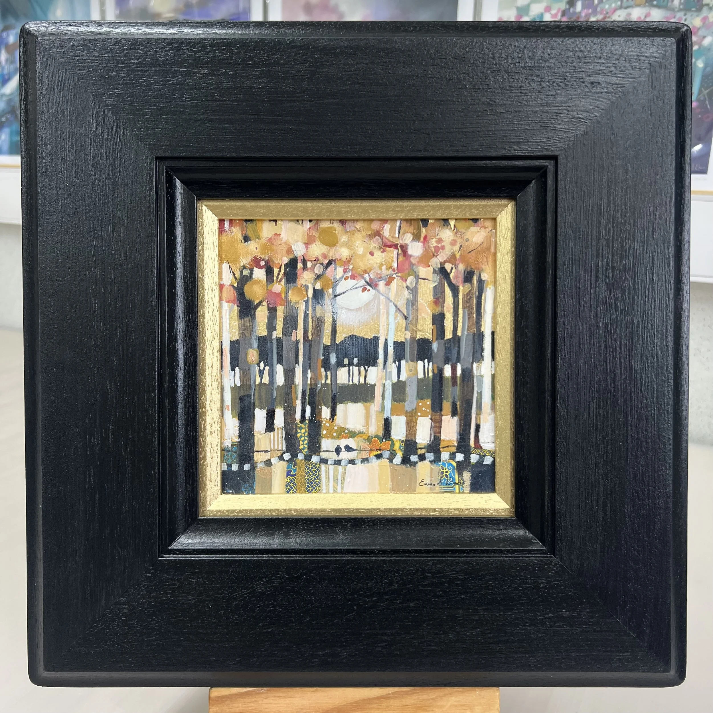 Original painting by Emma S Davis Artist shows 2 birds chattering on a fence amongst autumnal moonlit trees. Framed in black and gold.