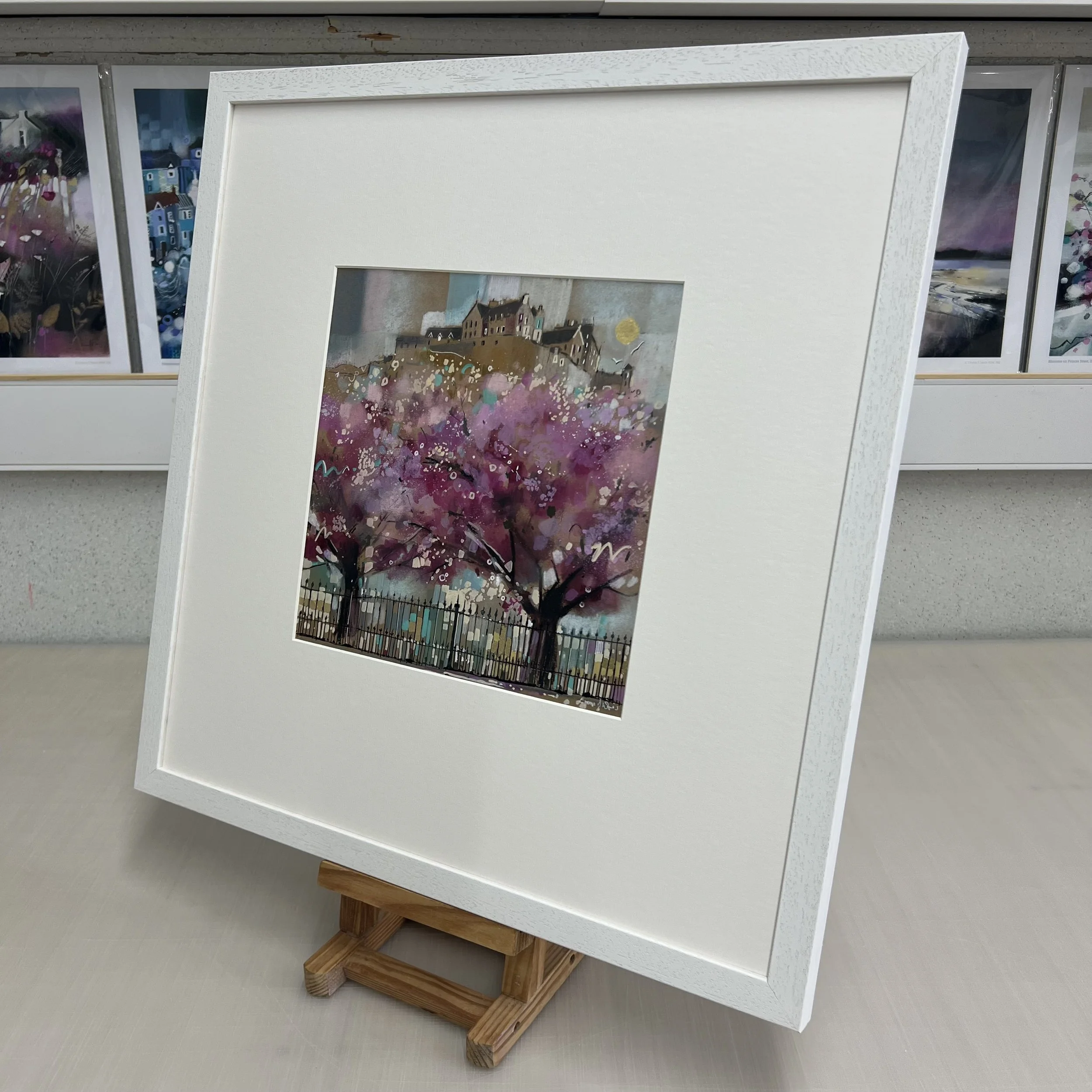 Edinburgh in Bloom by Emma S Davis – original mixed media artwork of Edinburgh Castle overlooking blossom trees in Princes Street Gardens. Alternate view.