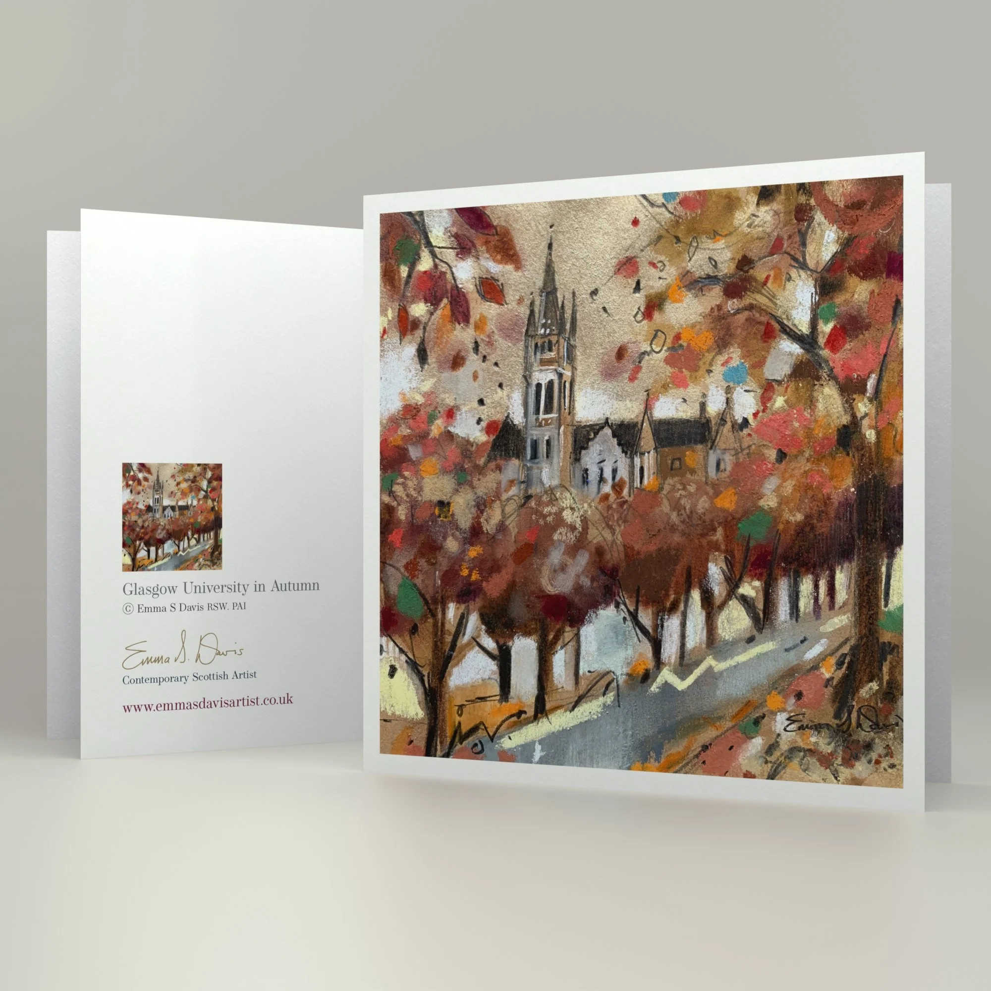Glasgow University's Gilbert Scott building dominates the skyline above the autumnal tree lined avenue in Emma S Davis Artist's art greetings card