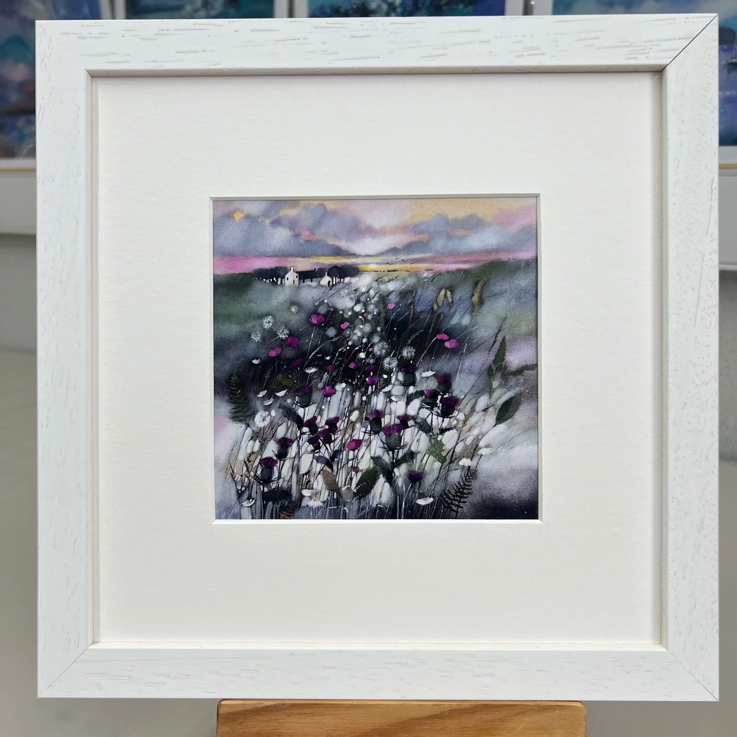 Framed Art Card The Thistle, Flower of Scotland by Scottish Landscape Artist Emma S Davis. White Frame.