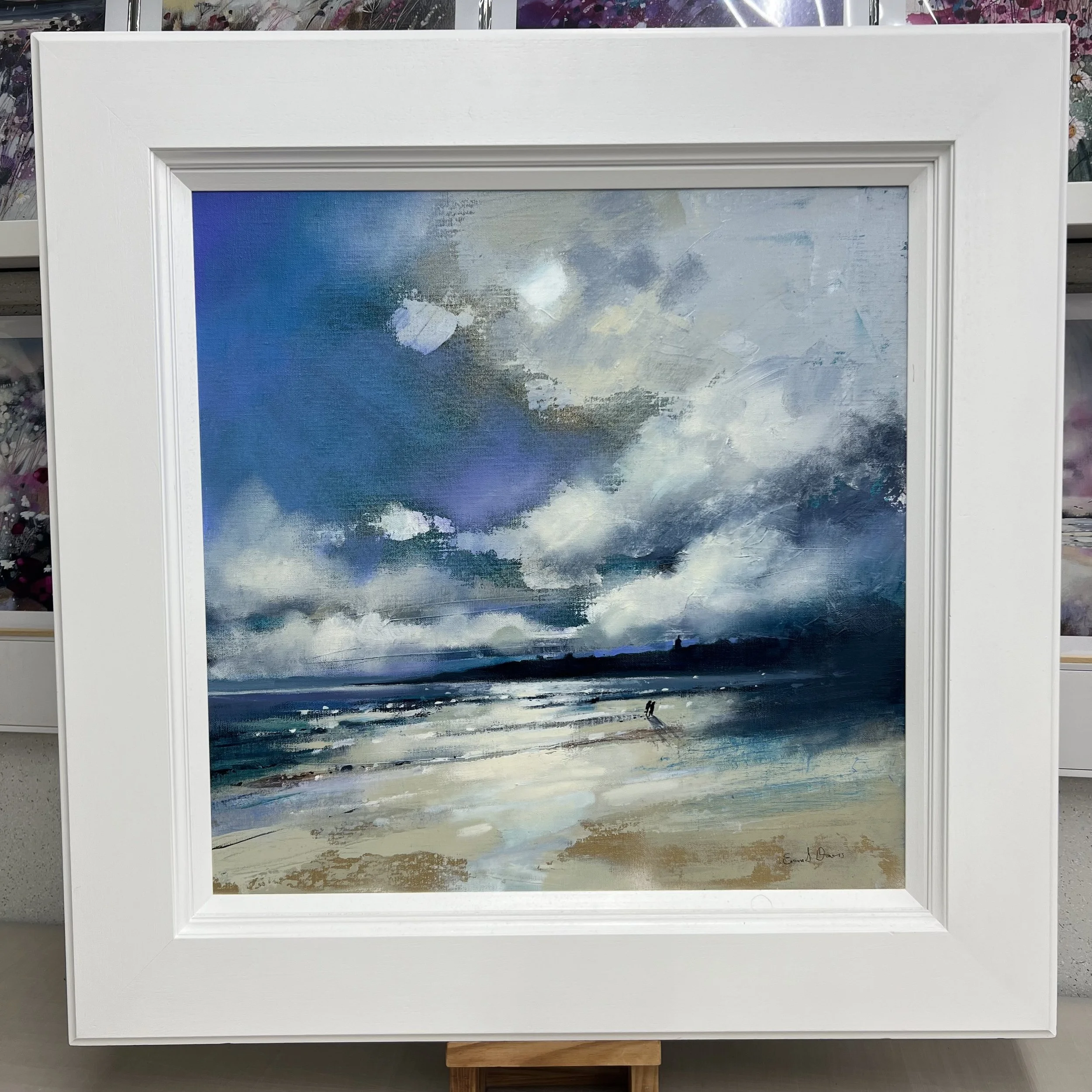 Tide’s Out, West Sands, St Andrews by Emma S Davis – original oil painting of West Sands beach with dramatic skies and two figures walking along the shoreline. Framed view.