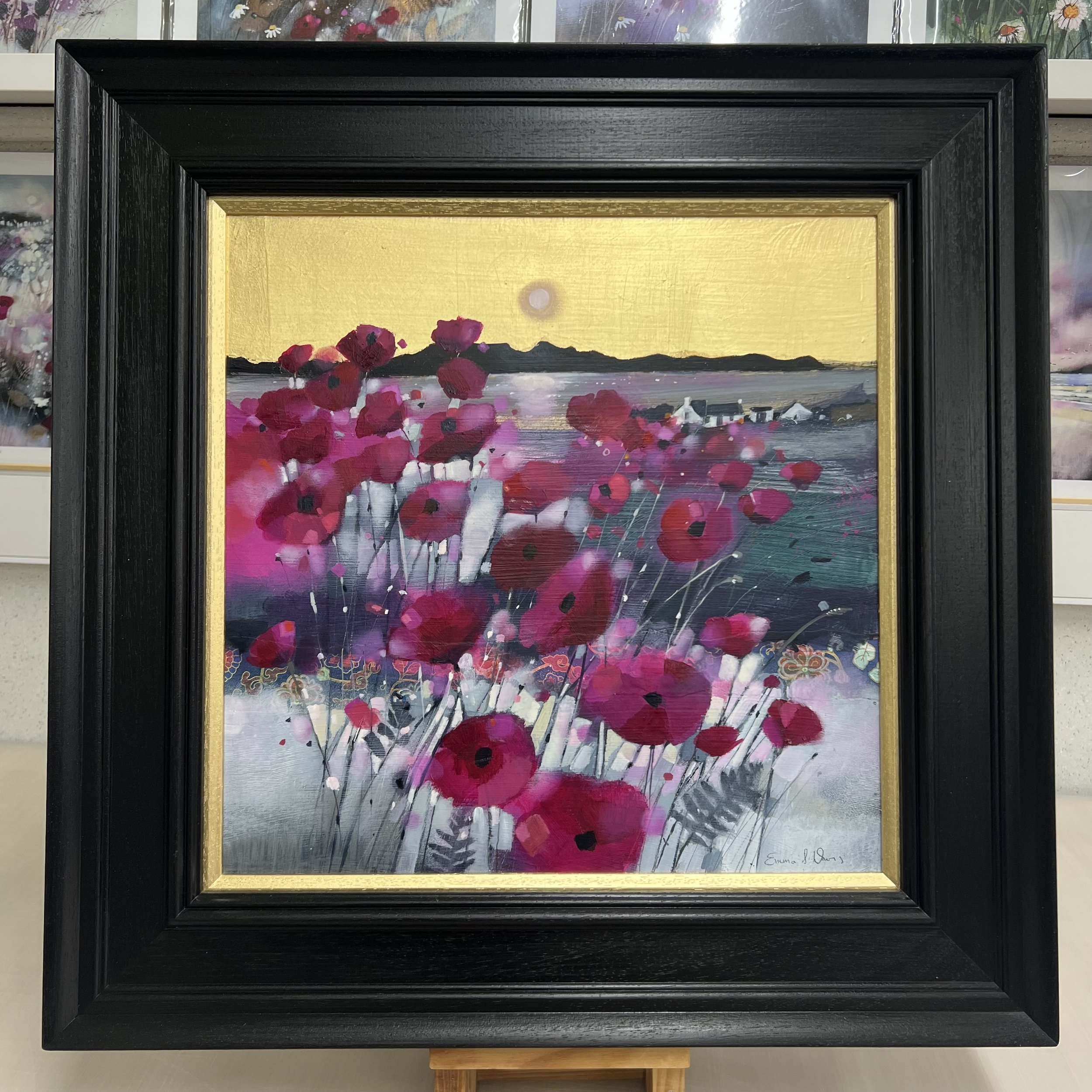 Original oil painting with gold leaf of vibrant poppy fields overlooking the Isle of Arran across the Firth of Clyde by Scottish artist Emma S Davis. Framed view.