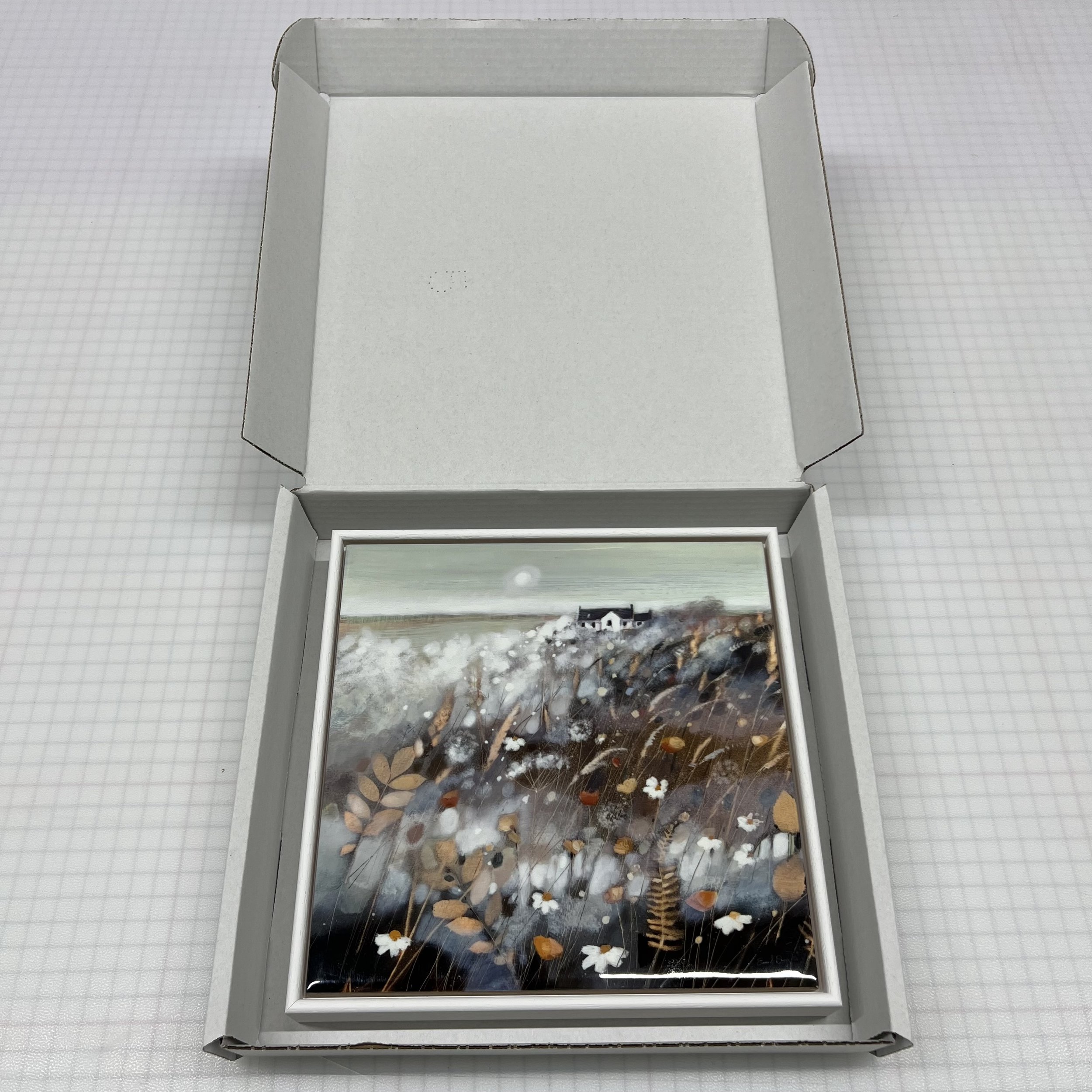 Isle of Skye framed ceramic tile 'Wild Field, Skye' by Emma S Davis Artist. Packaging.