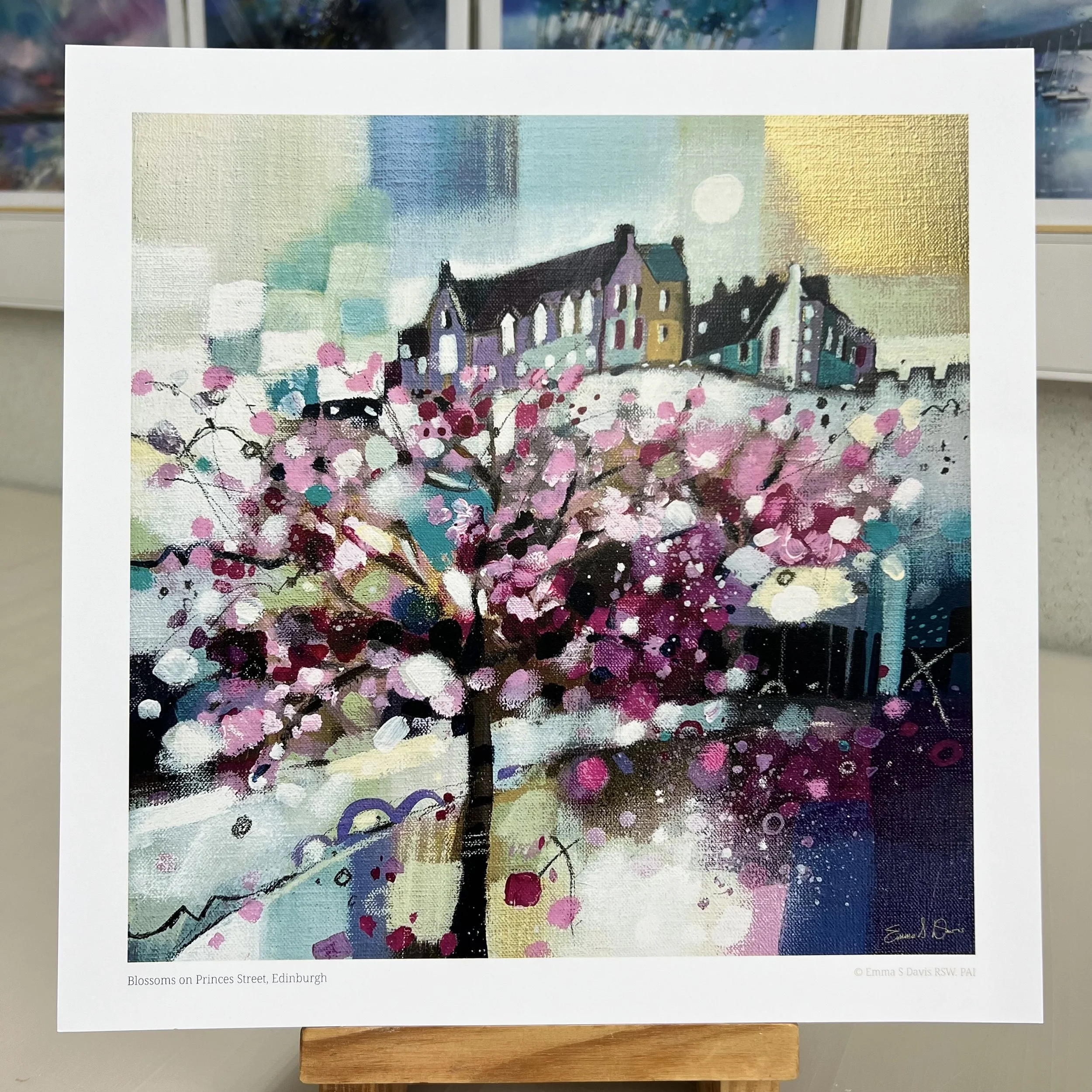Blossom trees in Princes Street Gardens below Edinburgh Castle come to life in Emma S Davis Artist's open edition art print.