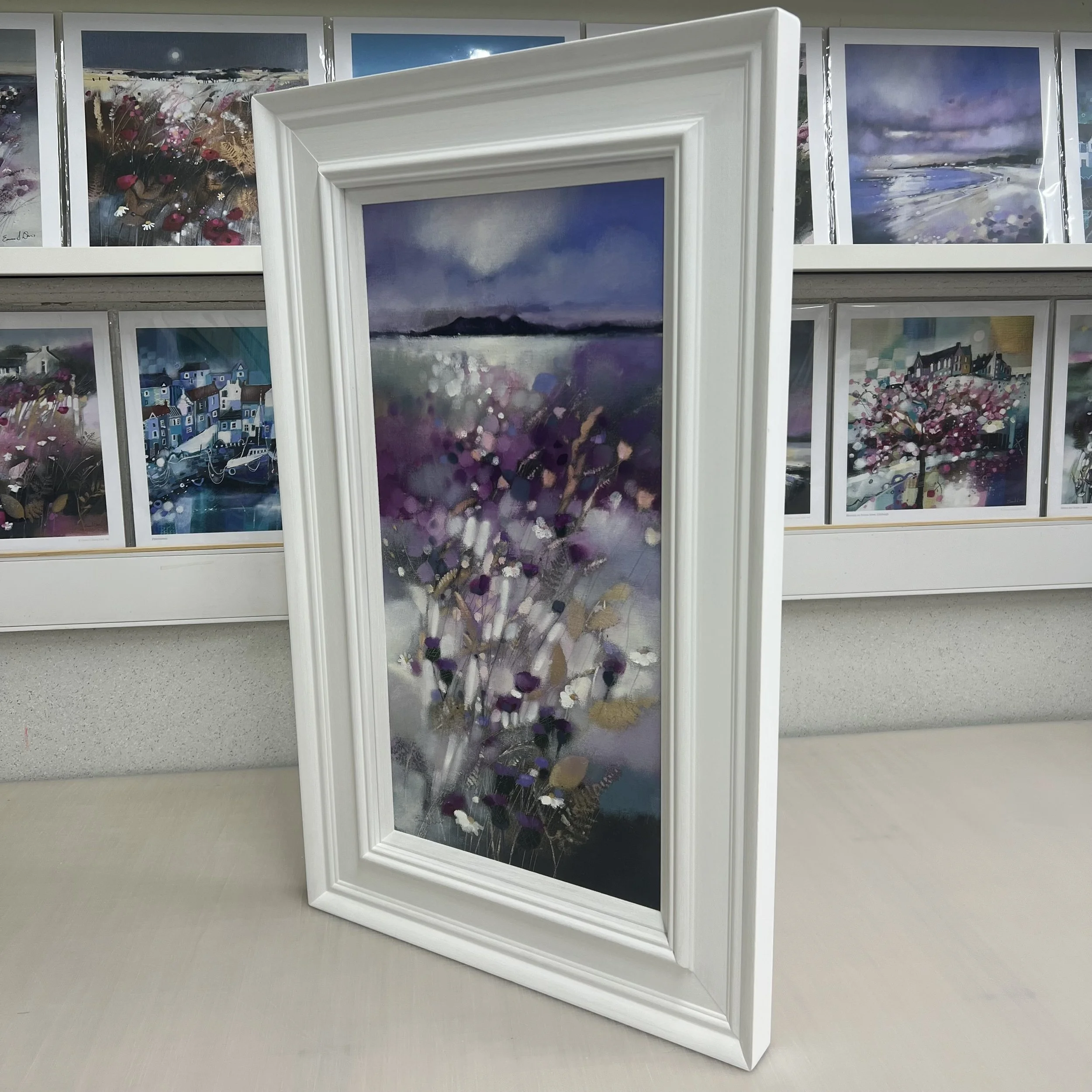 Framed original Arran painting showing the silhouette of the Isle of Arran from the Ayrshire coast. Alternate view.