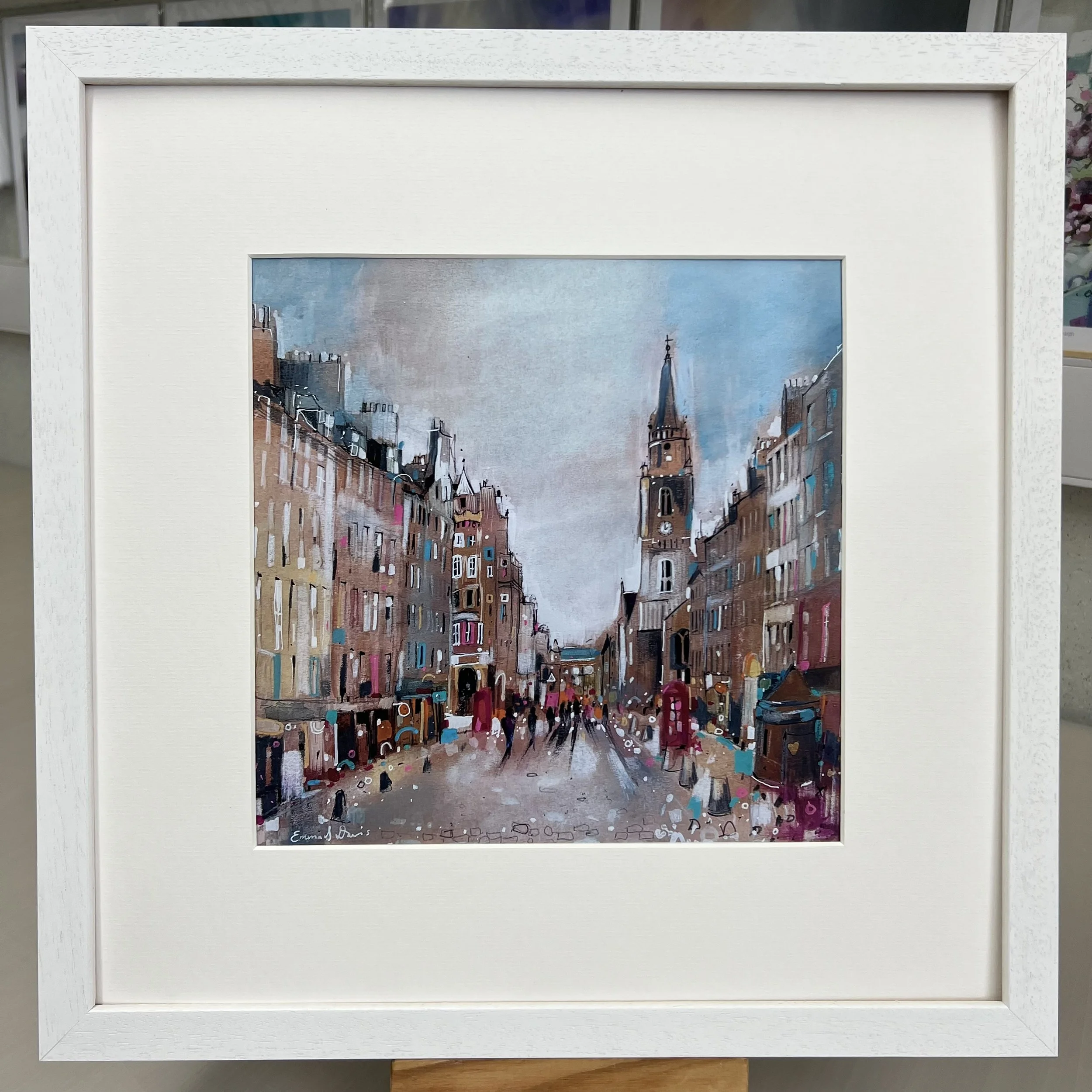 Royal Mile Edinburgh art print featuring one of Edinburgh’s most famous historic streets in Scotland by Emma S Davis Artist. Framed white option.